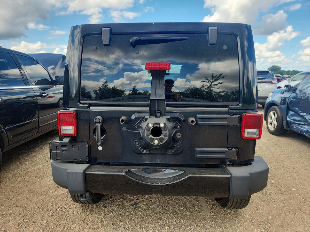 2012 Jeep Wrangler Unlimited Sahara Черный vin: 1C4BJWEG7CL255343