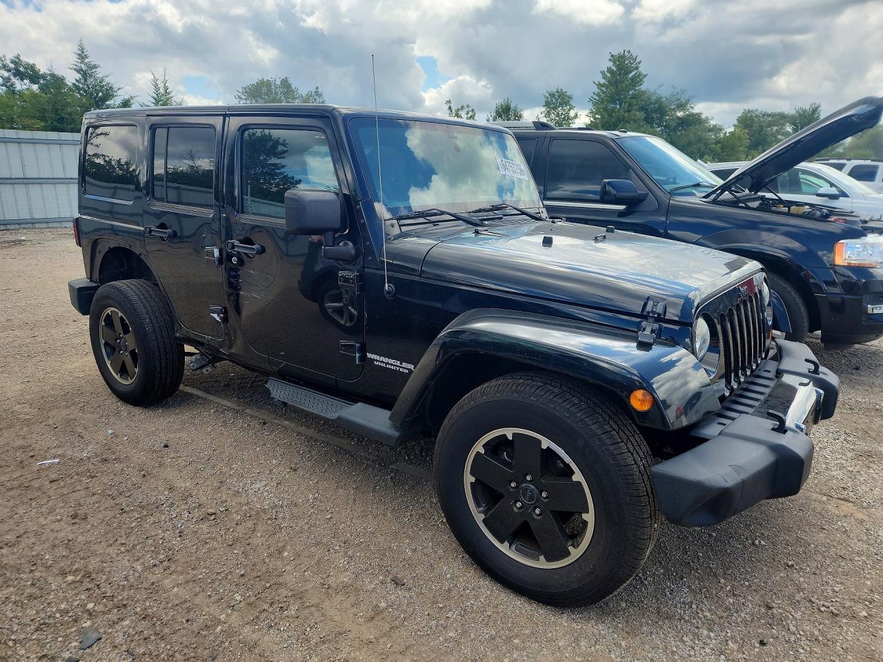 2012 Jeep Wrangler Unlimited Sahara Черный vin: 1C4BJWEG7CL255343