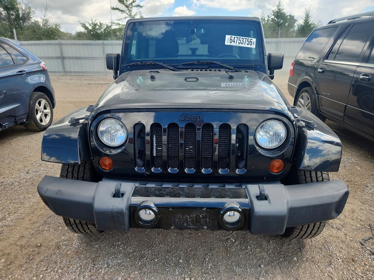 2012 Jeep Wrangler Unlimited Sahara Черный vin: 1C4BJWEG7CL255343