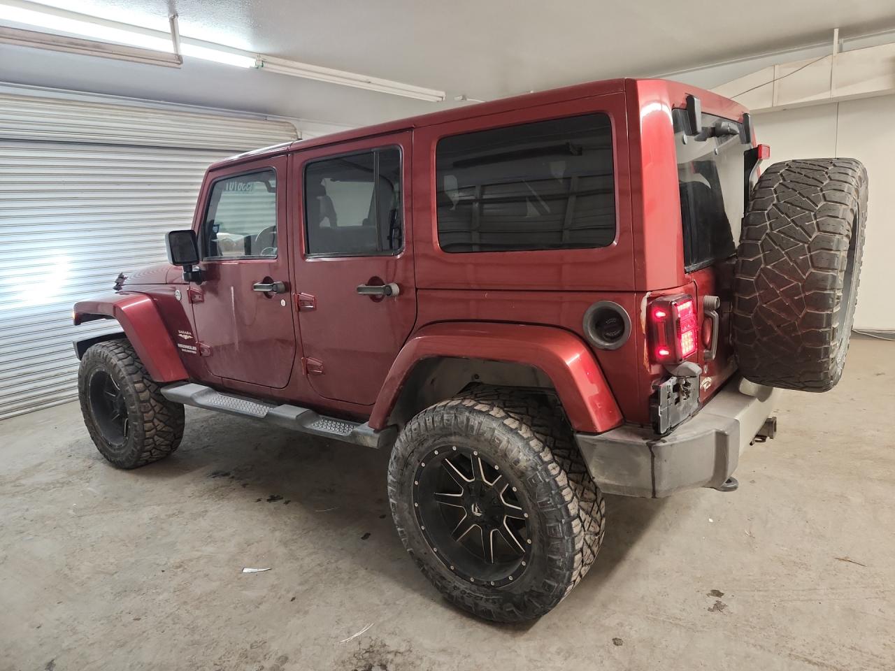 2013 Jeep Wrangler Unlimited Sahara Burgundy vin: 1C4BJWEG7DL503365 Damage: Left Qtr Panel, Multiple Scratches Light, 4