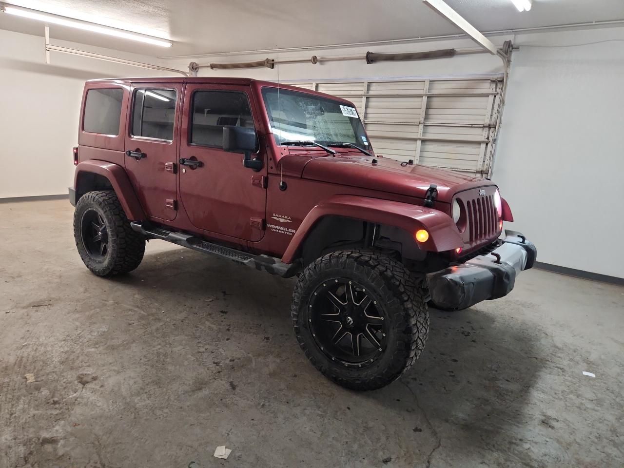2013 Jeep Wrangler Unlimited Sahara Burgundy vin: 1C4BJWEG7DL503365 Damage: Right Rear Wheel, Aftermarket, Replacement Required