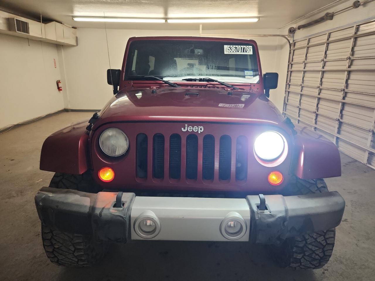 2013 Jeep Wrangler Unlimited Sahara Burgundy vin: 1C4BJWEG7DL503365 Damage: Front Bumper, Dent(S) W/No Paint Dmg, > 12 Inches