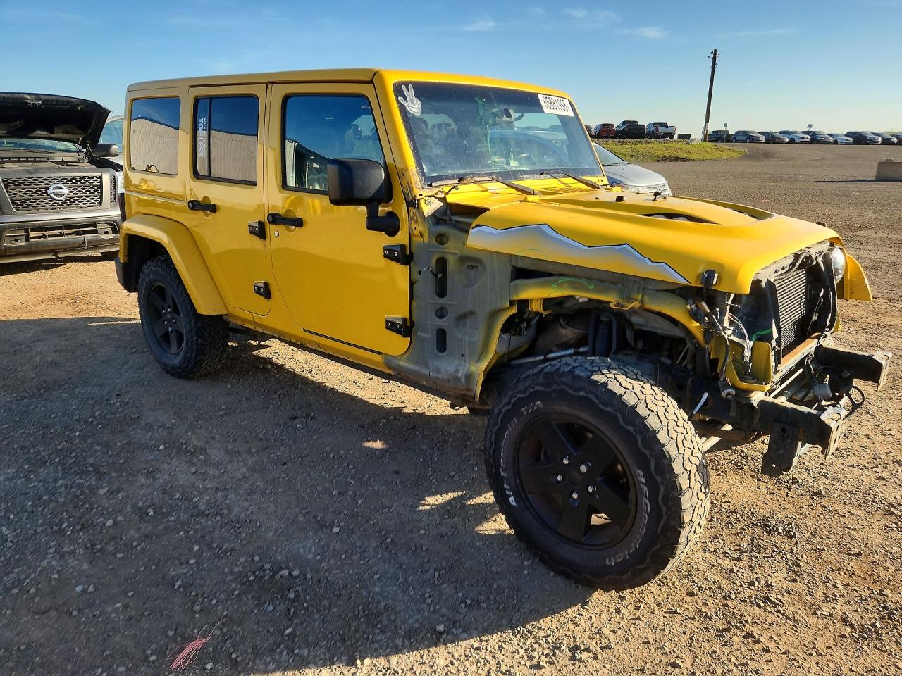 2015 Jeep Wrangler Unlimited Sahara Yellow vin: 1C4BJWEG7FL615540