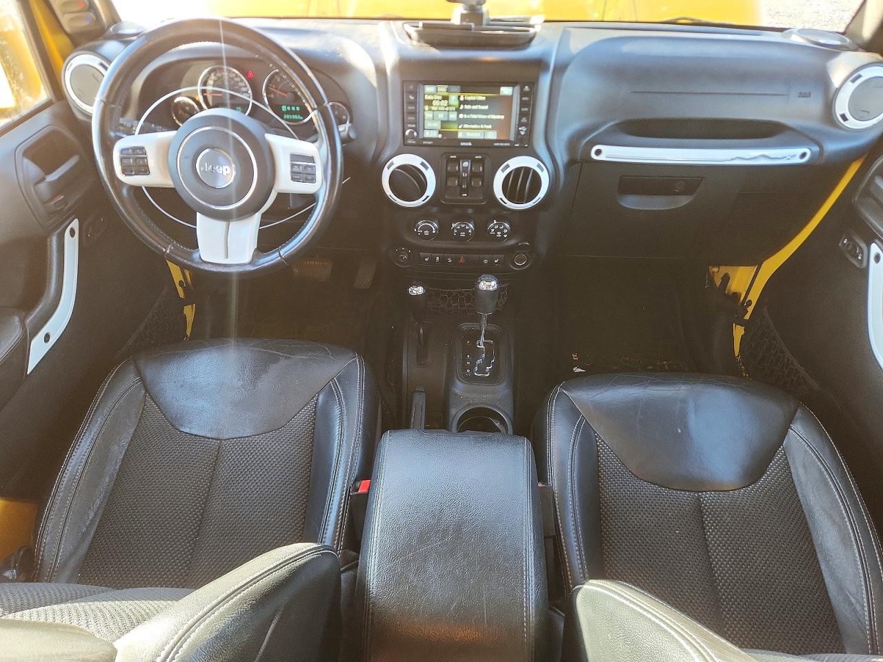 2015 Jeep Wrangler Unlimited Sahara Yellow vin: 1C4BJWEG7FL615540