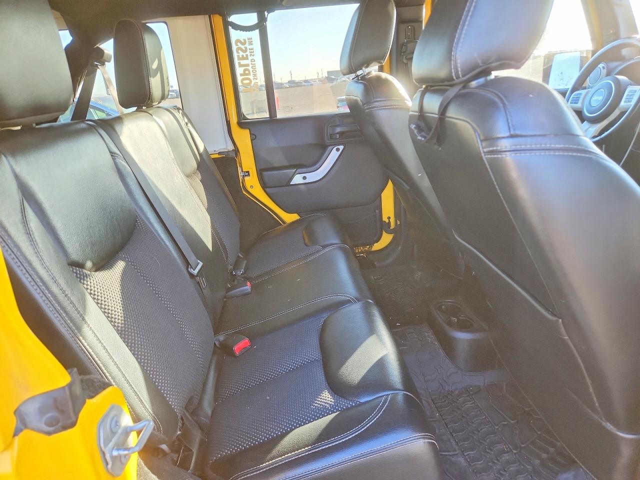 2015 Jeep Wrangler Unlimited Sahara Yellow vin: 1C4BJWEG7FL615540