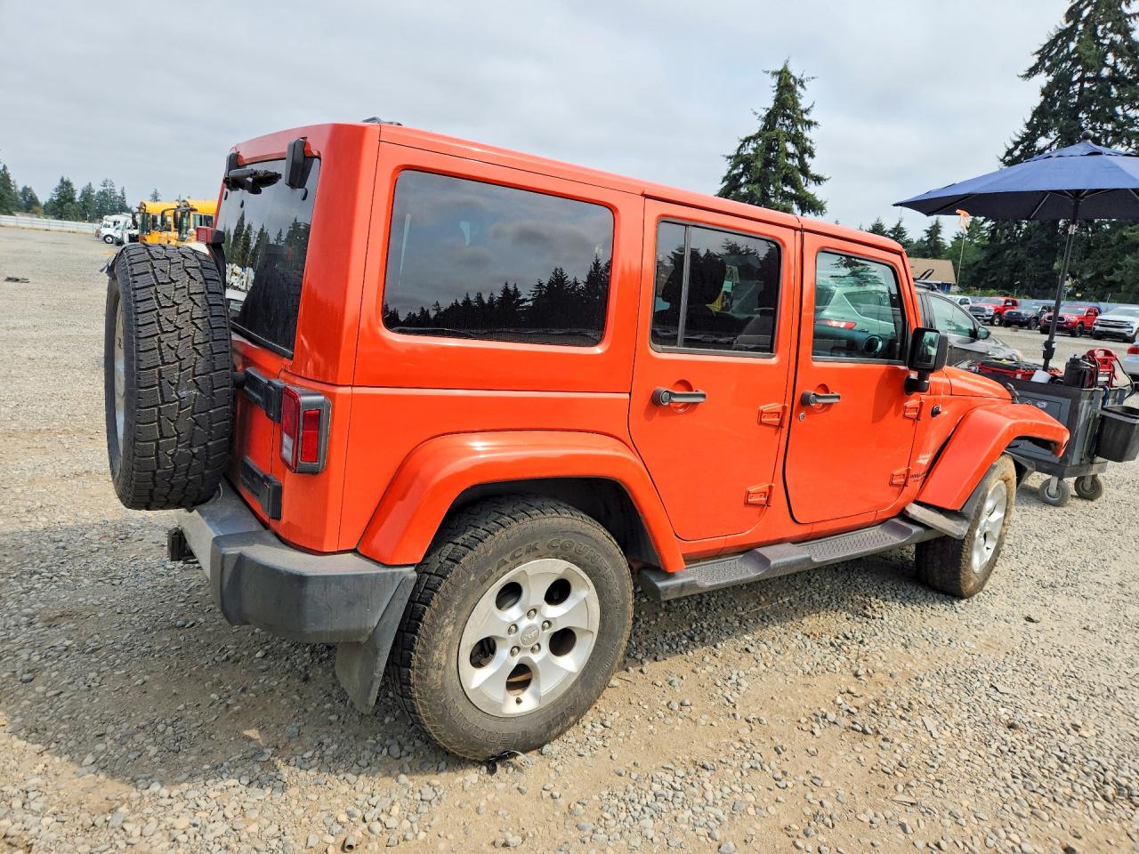2015 Jeep Wrangler Unlimited Sahara Orange vin: 1C4BJWEG7FL665998