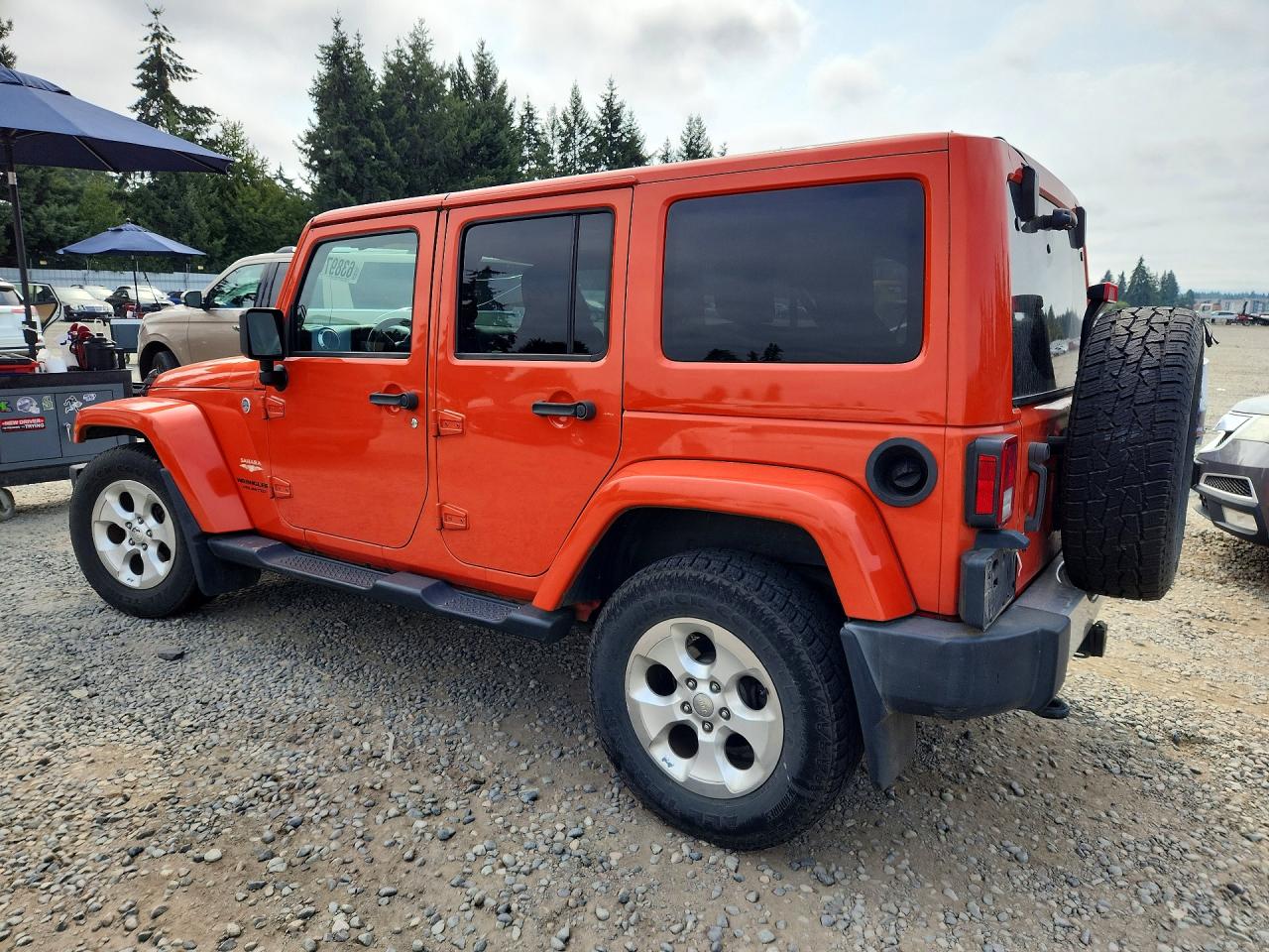 2015 Jeep Wrangler Unlimited Sahara Orange vin: 1C4BJWEG7FL665998