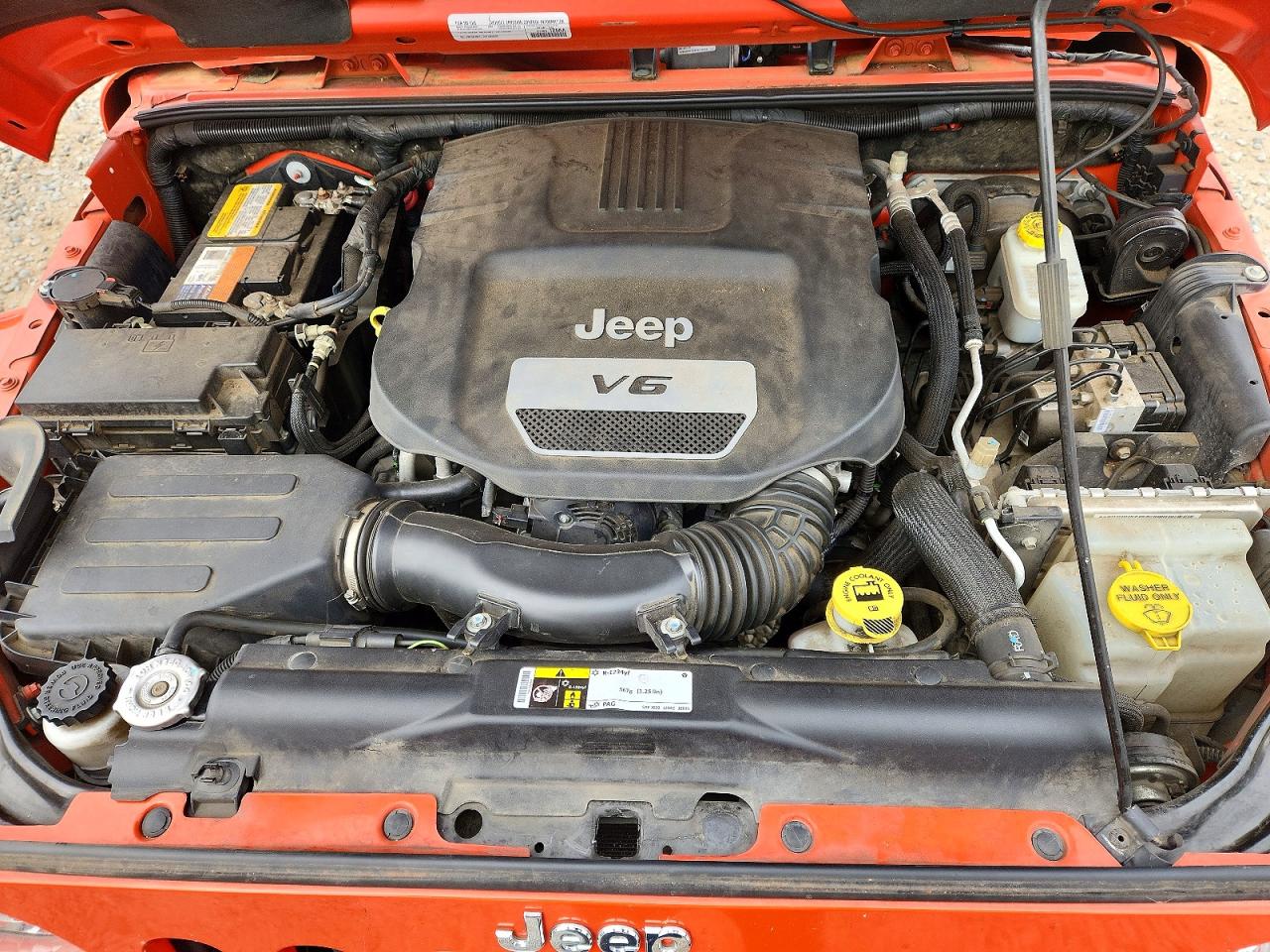 2015 Jeep Wrangler Unlimited Sahara Orange vin: 1C4BJWEG7FL665998
