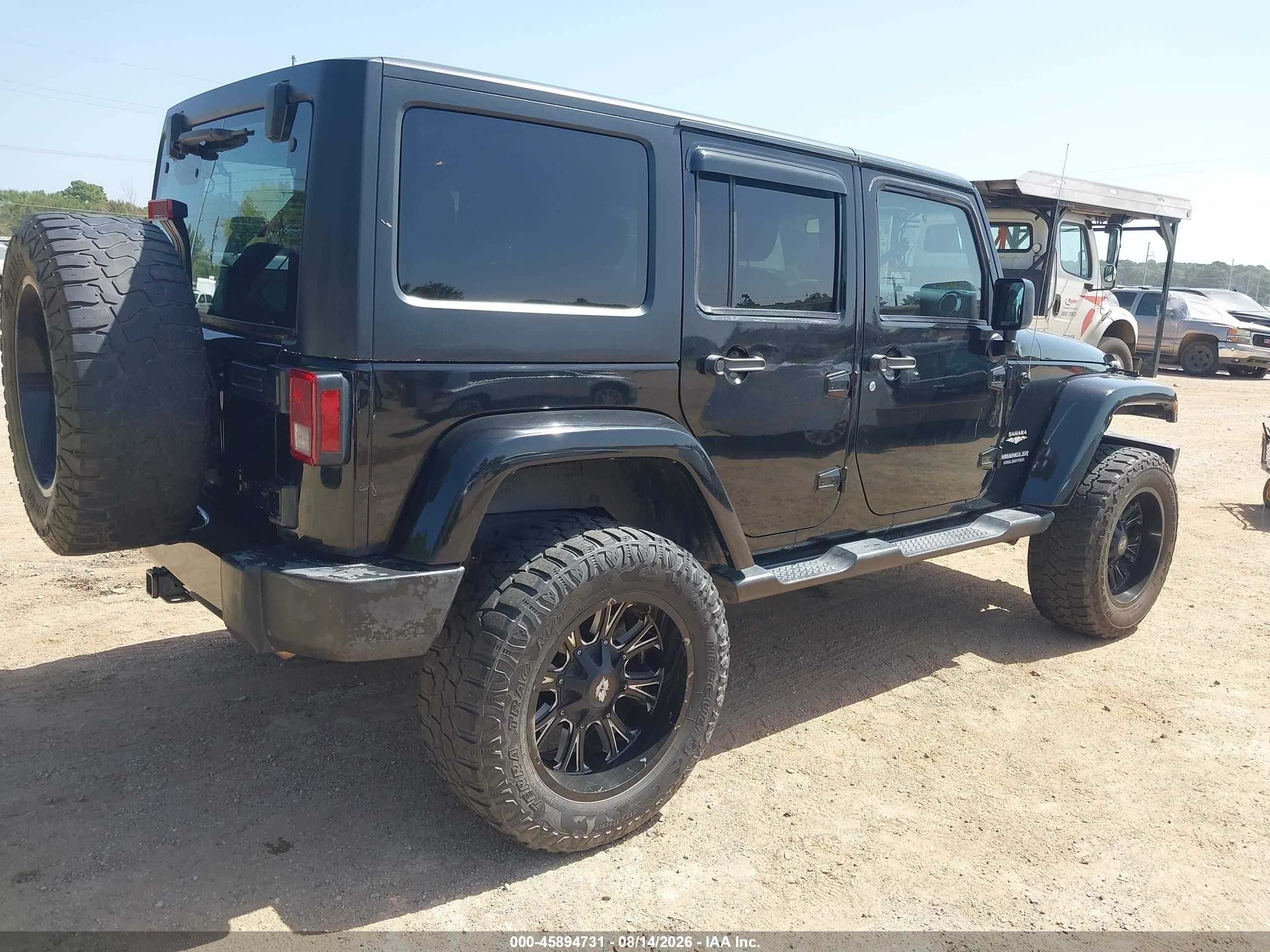 2015 Jeep Wrangler Unlimited Sahara Black vin: 1C4BJWEG7FL685524