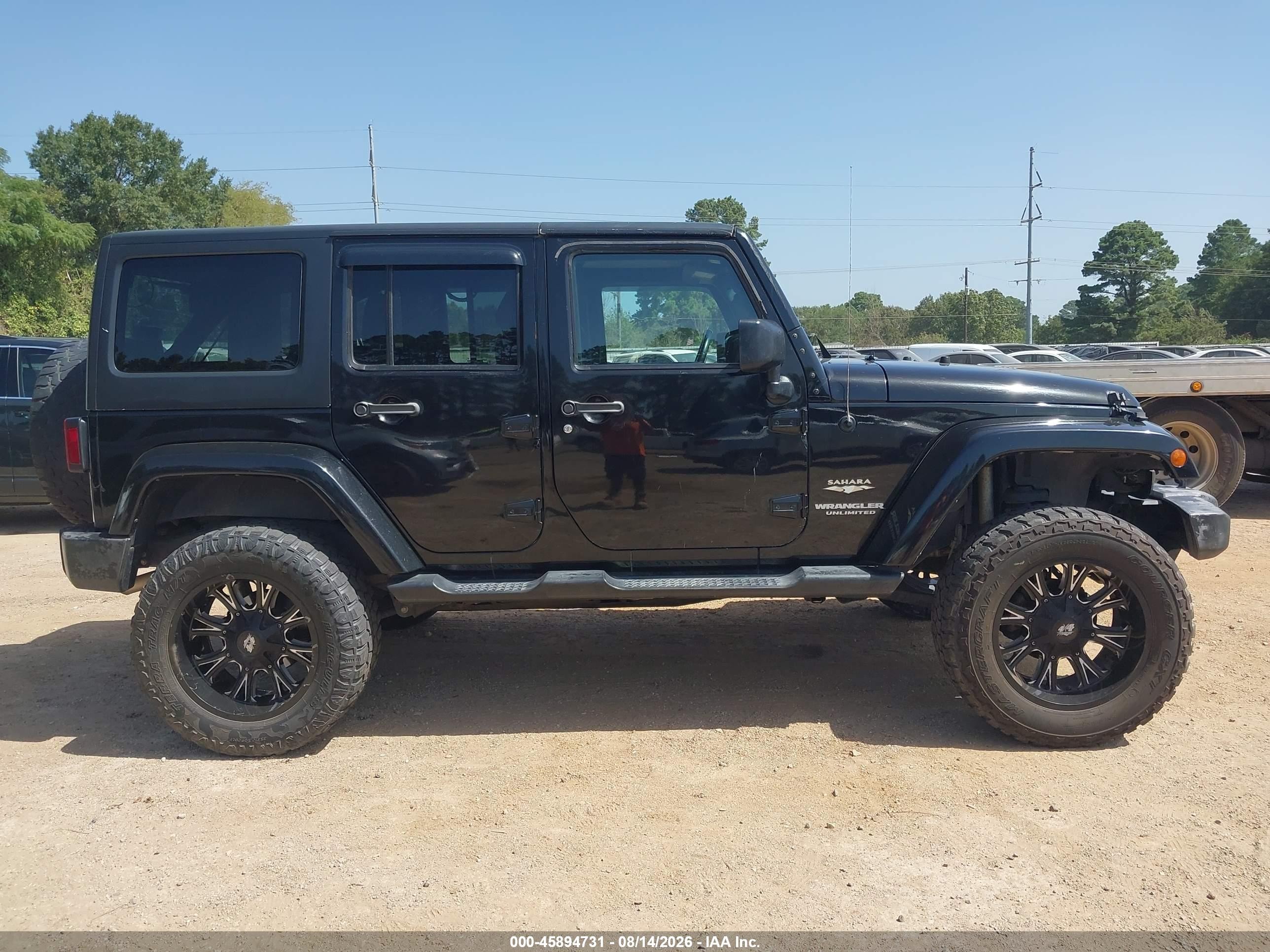 2015 Jeep Wrangler Unlimited Sahara Black vin: 1C4BJWEG7FL685524