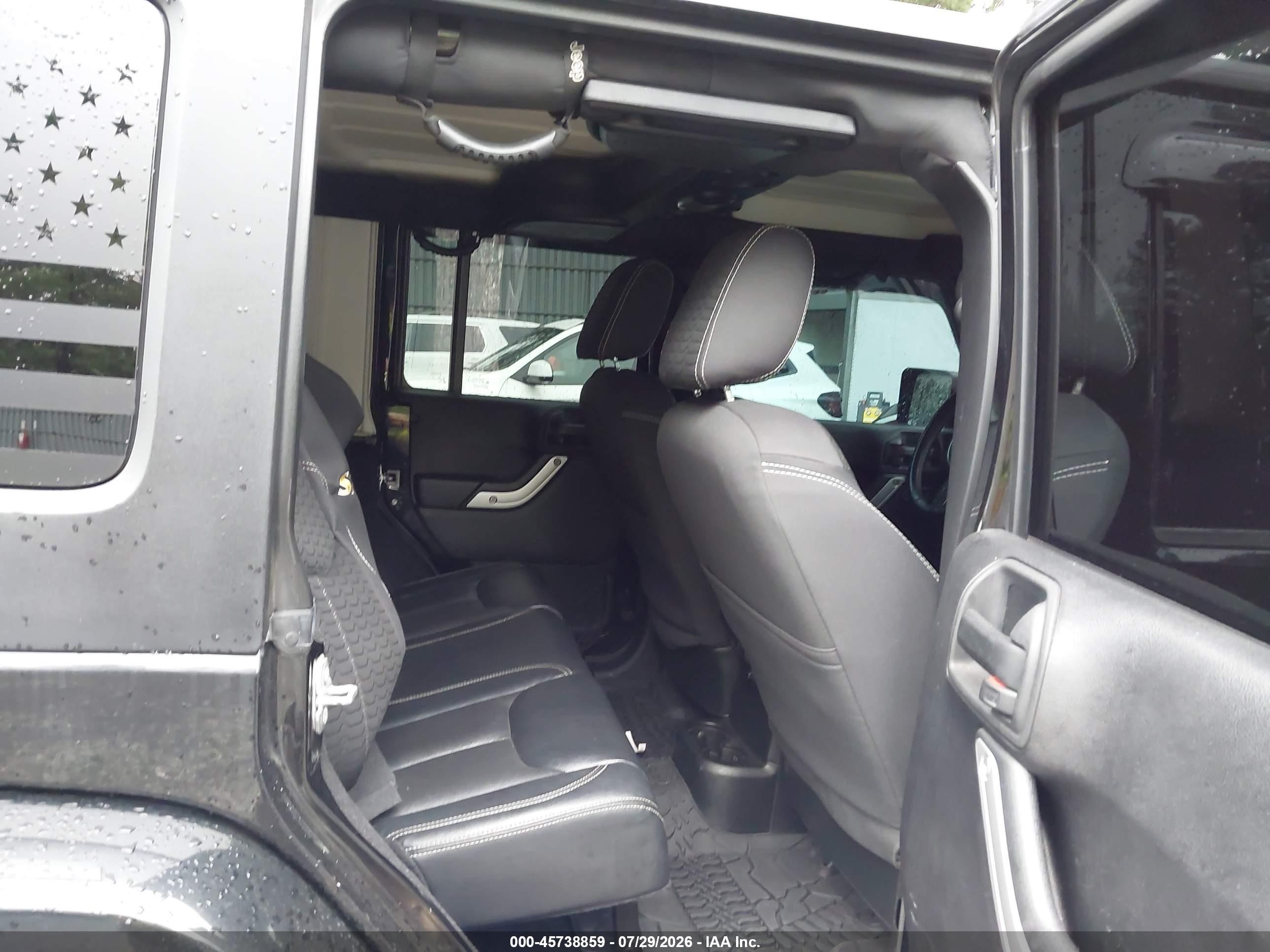2015 Jeep Wrangler Unlimited Sahara Black vin: 1C4BJWEG7FL694983