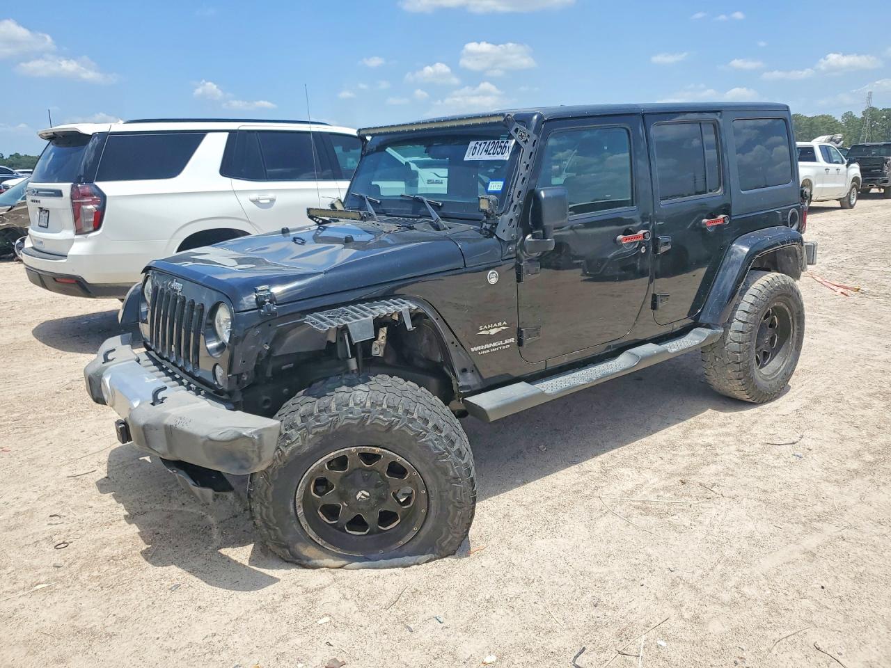 2015 Jeep Wrangler Unlimited Sahara Black vin: 1C4BJWEG7FL704508