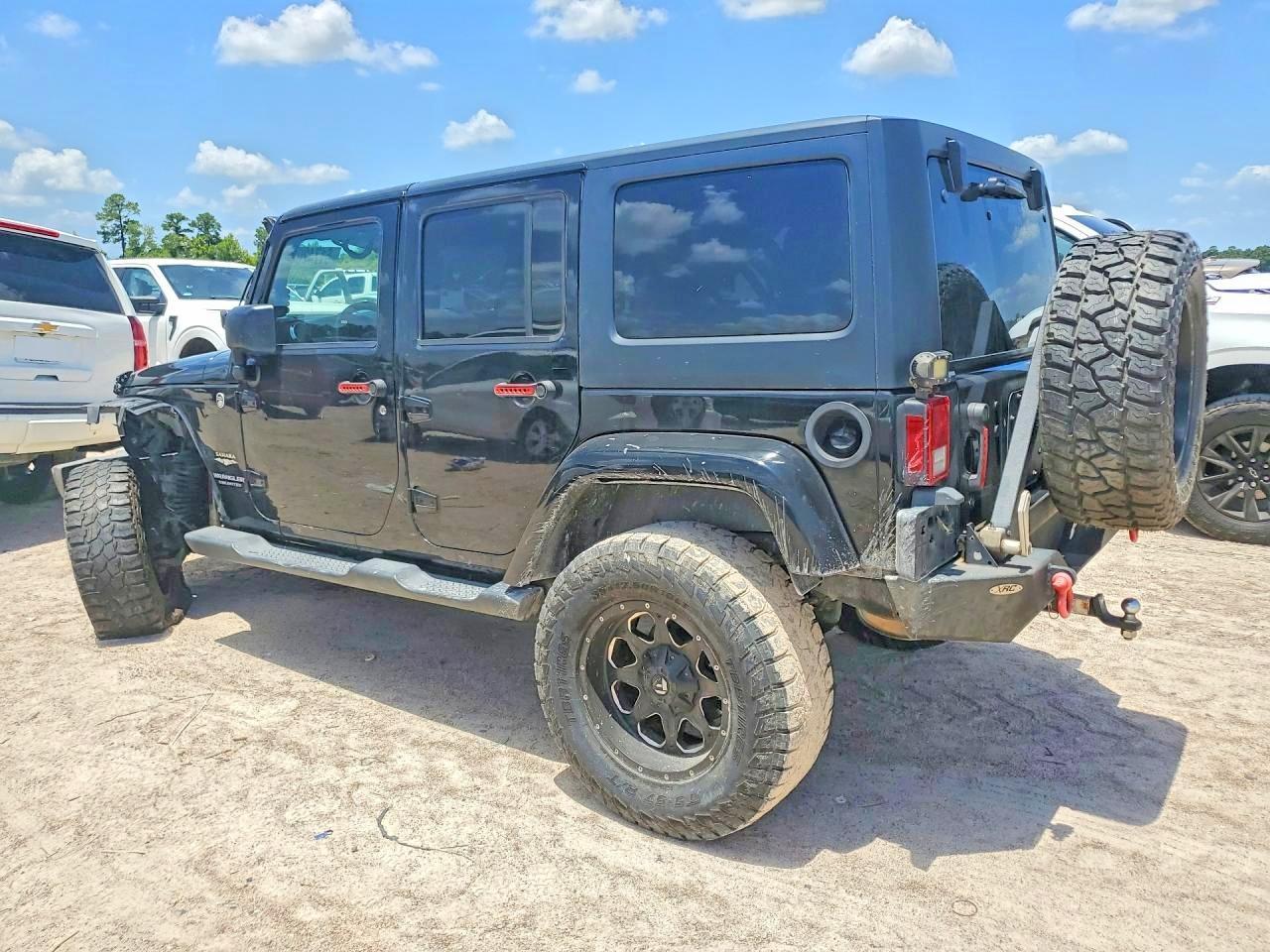2015 Jeep Wrangler Unlimited Sahara Black vin: 1C4BJWEG7FL704508