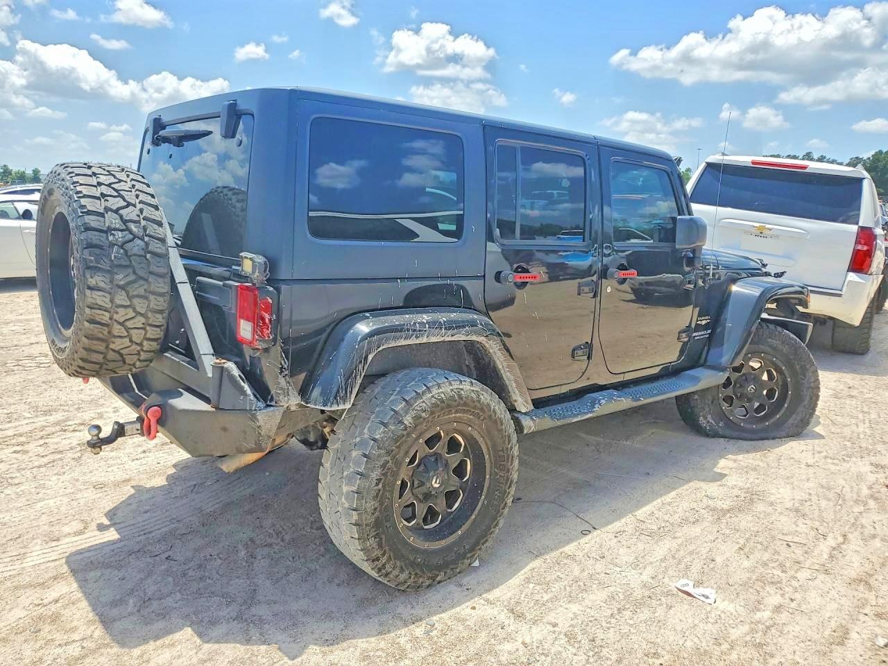 2015 Jeep Wrangler Unlimited Sahara Black vin: 1C4BJWEG7FL704508