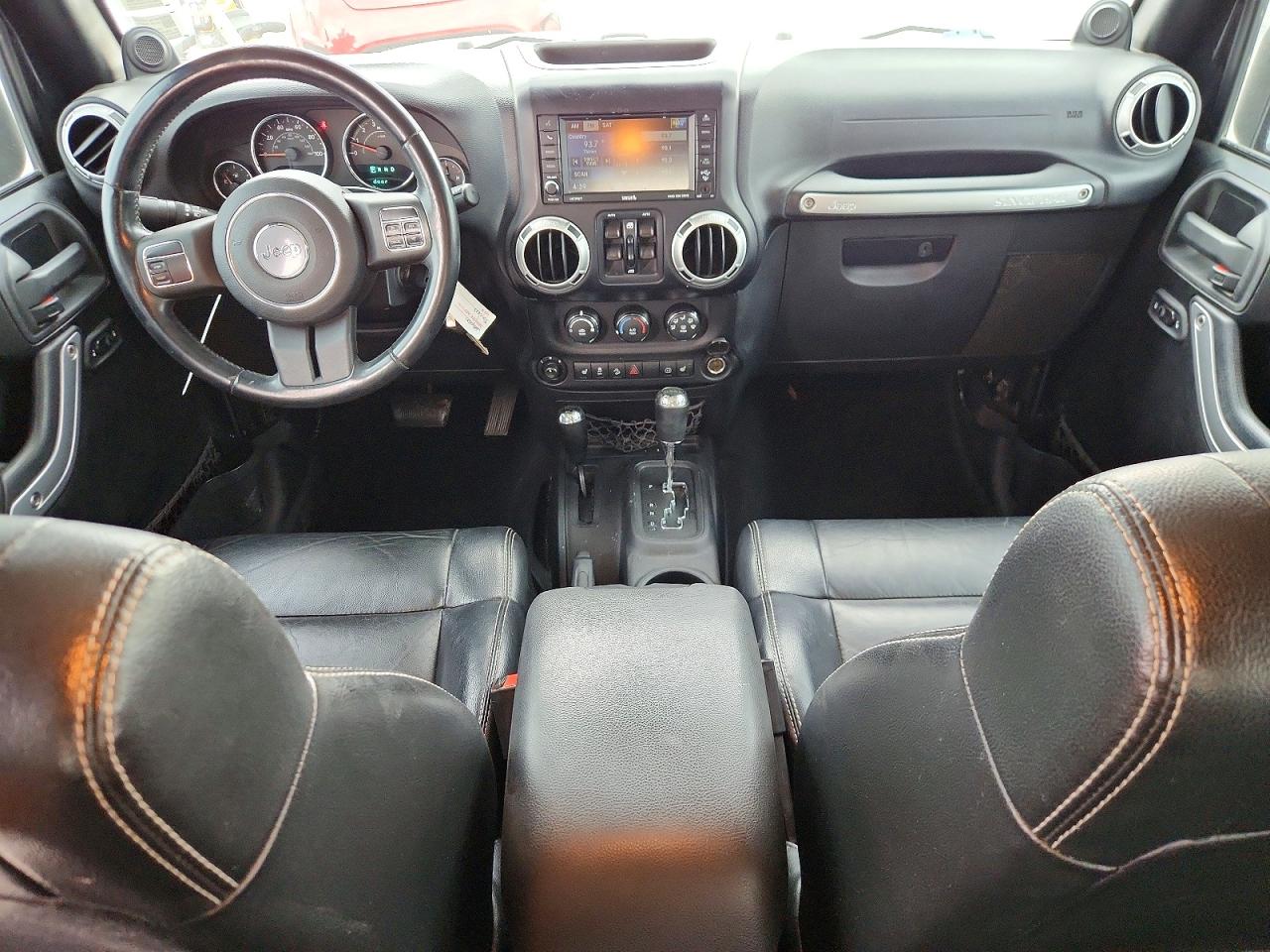 2012 Jeep Wrangler Unlimited Sahara Черный vin: 1C4BJWEG8CL184802