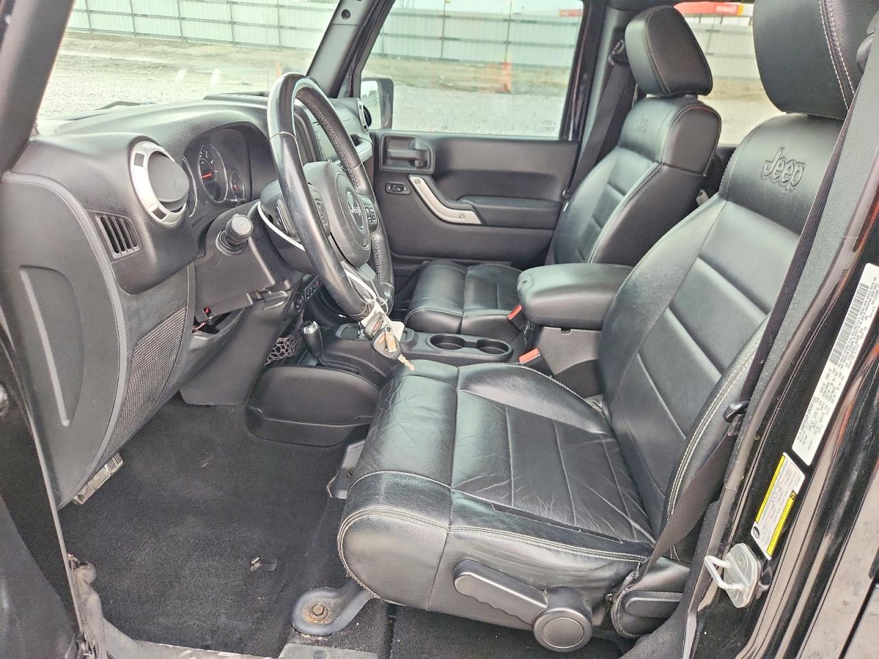 2012 Jeep Wrangler Unlimited Sahara Черный vin: 1C4BJWEG8CL184802