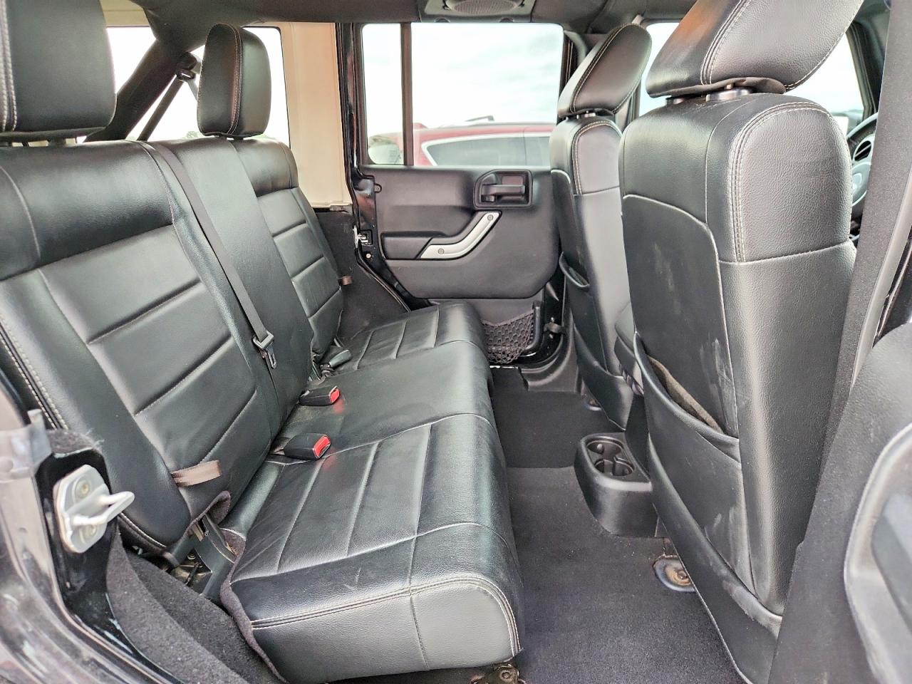 2012 Jeep Wrangler Unlimited Sahara Черный vin: 1C4BJWEG8CL184802