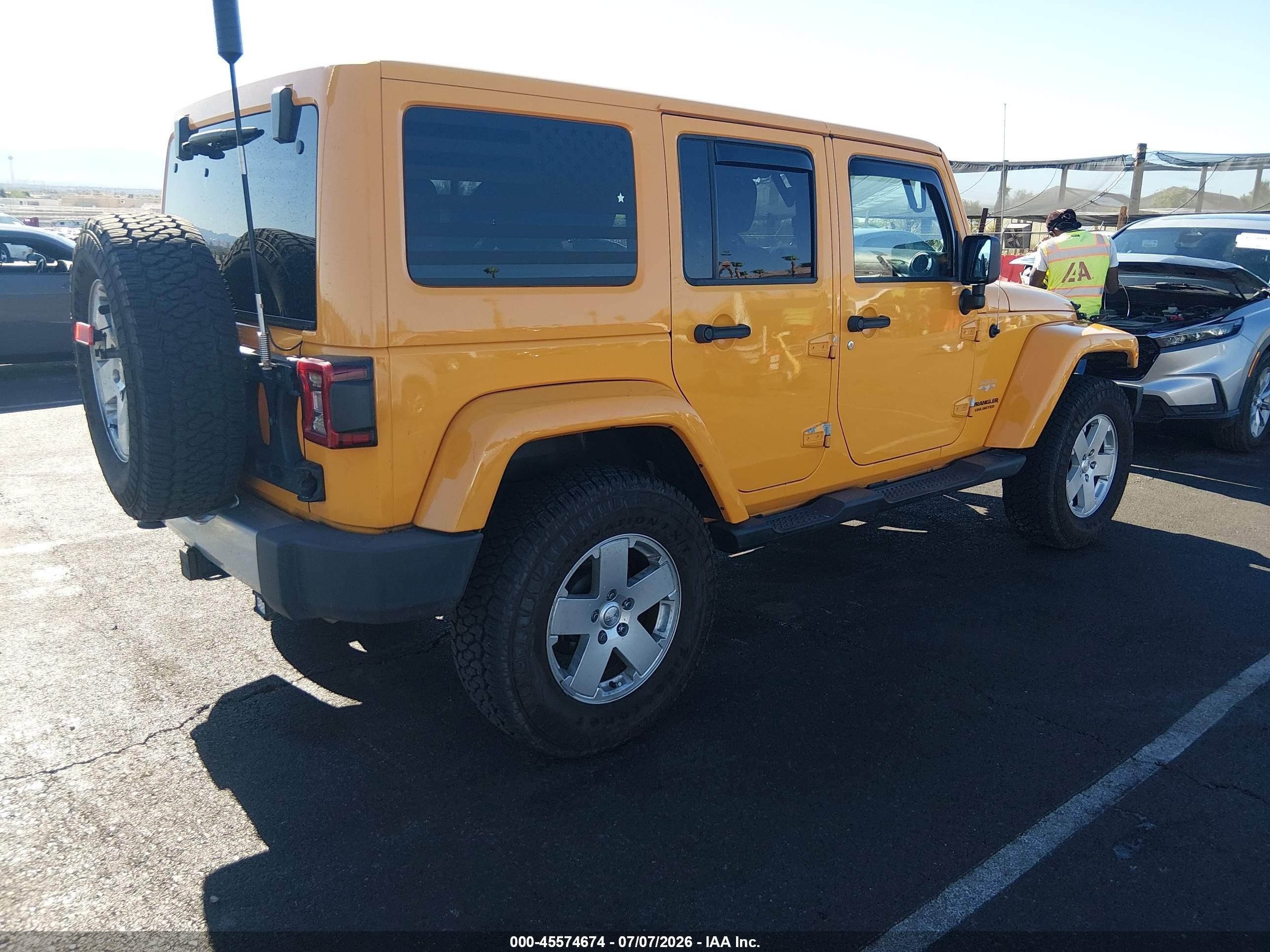 2012 Jeep Wrangler Unlimited Sahara Yellow vin: 1C4BJWEG8CL196559