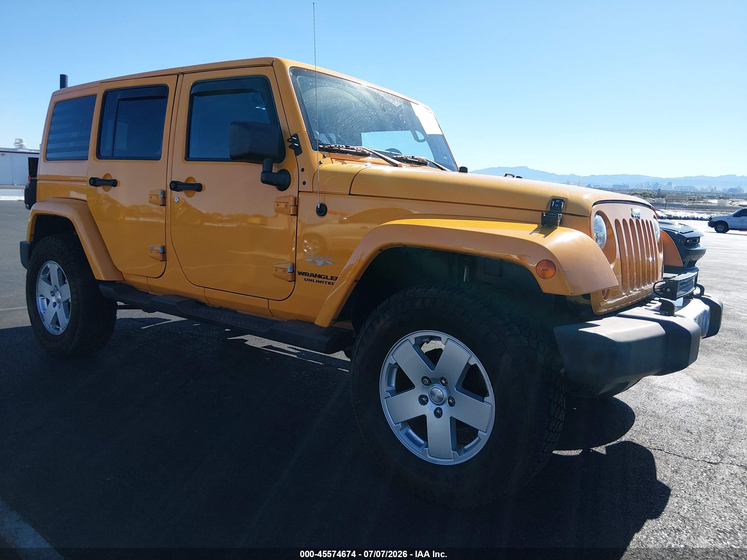 2012 Jeep Wrangler Unlimited Sahara Yellow vin: 1C4BJWEG8CL196559