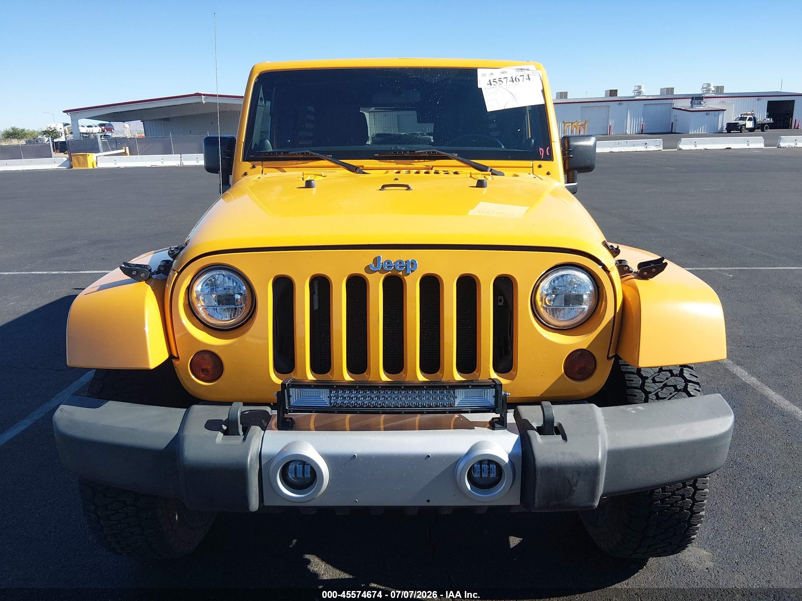 2012 Jeep Wrangler Unlimited Sahara Yellow vin: 1C4BJWEG8CL196559