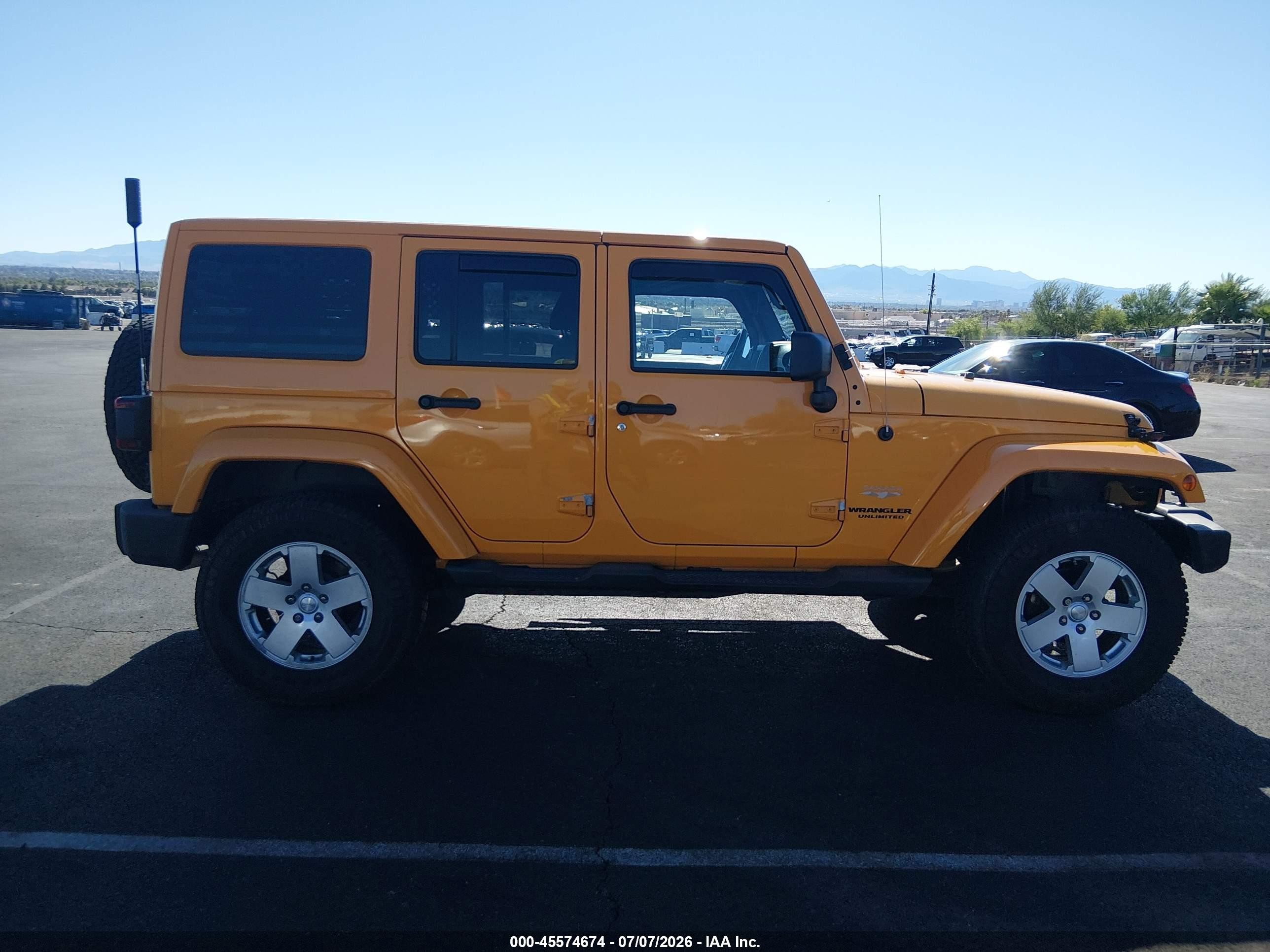 2012 Jeep Wrangler Unlimited Sahara Yellow vin: 1C4BJWEG8CL196559