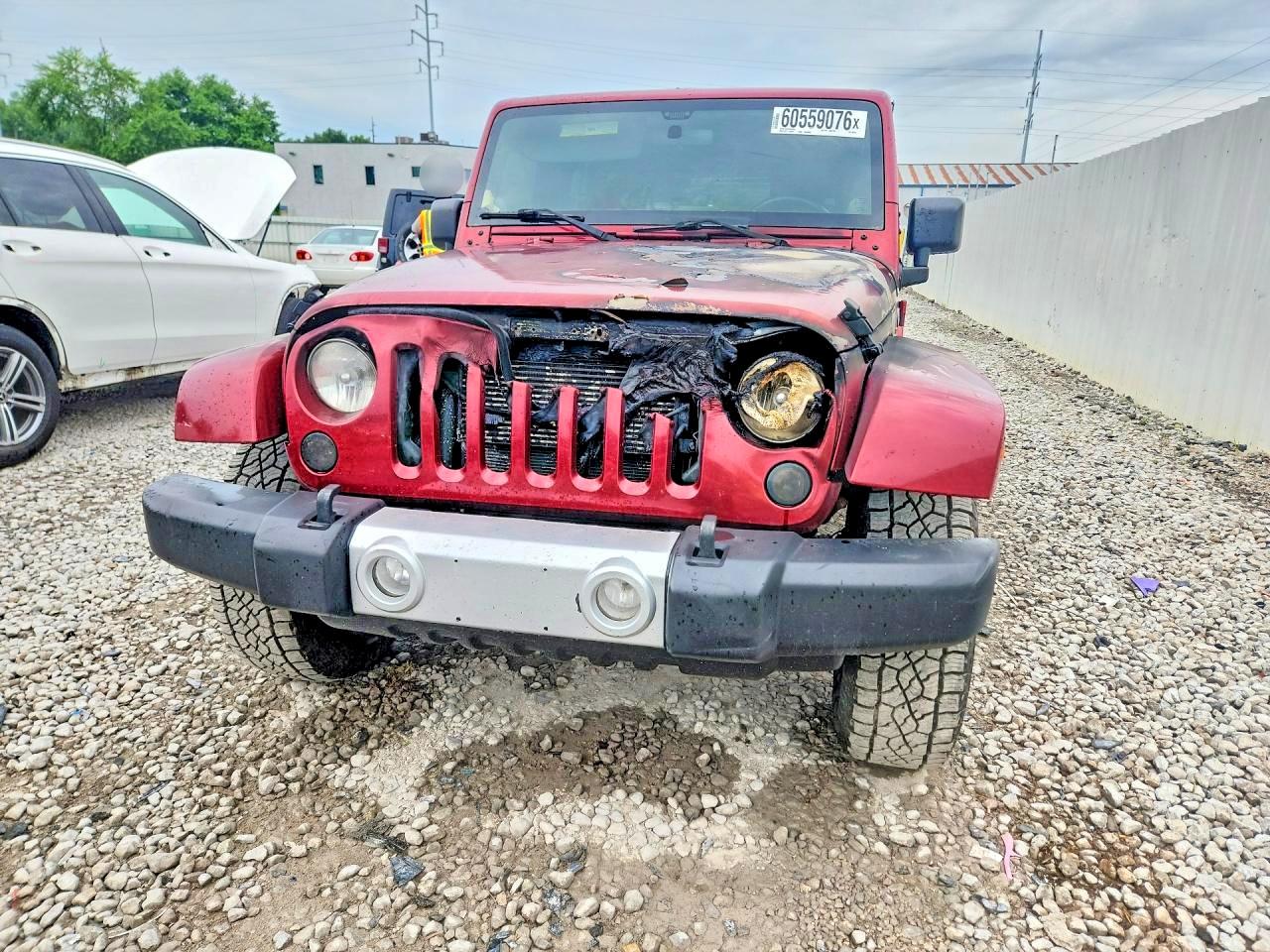 2012 Jeep Wrangler Unlimited Sahara Red vin: 1C4BJWEG8CL202019