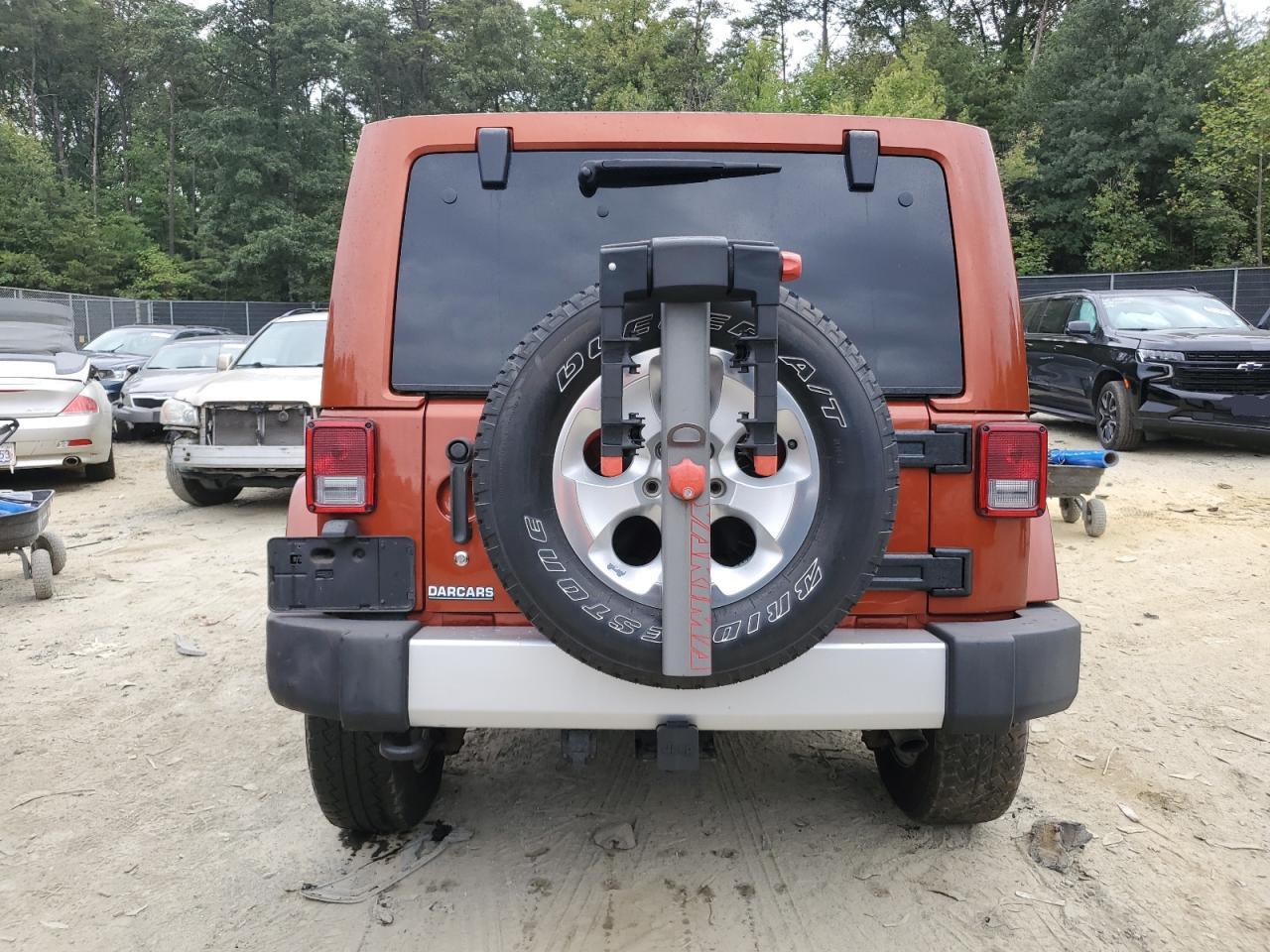2014 Jeep Wrangler Unlimited Sahara Orange vin: 1C4BJWEG8EL258447