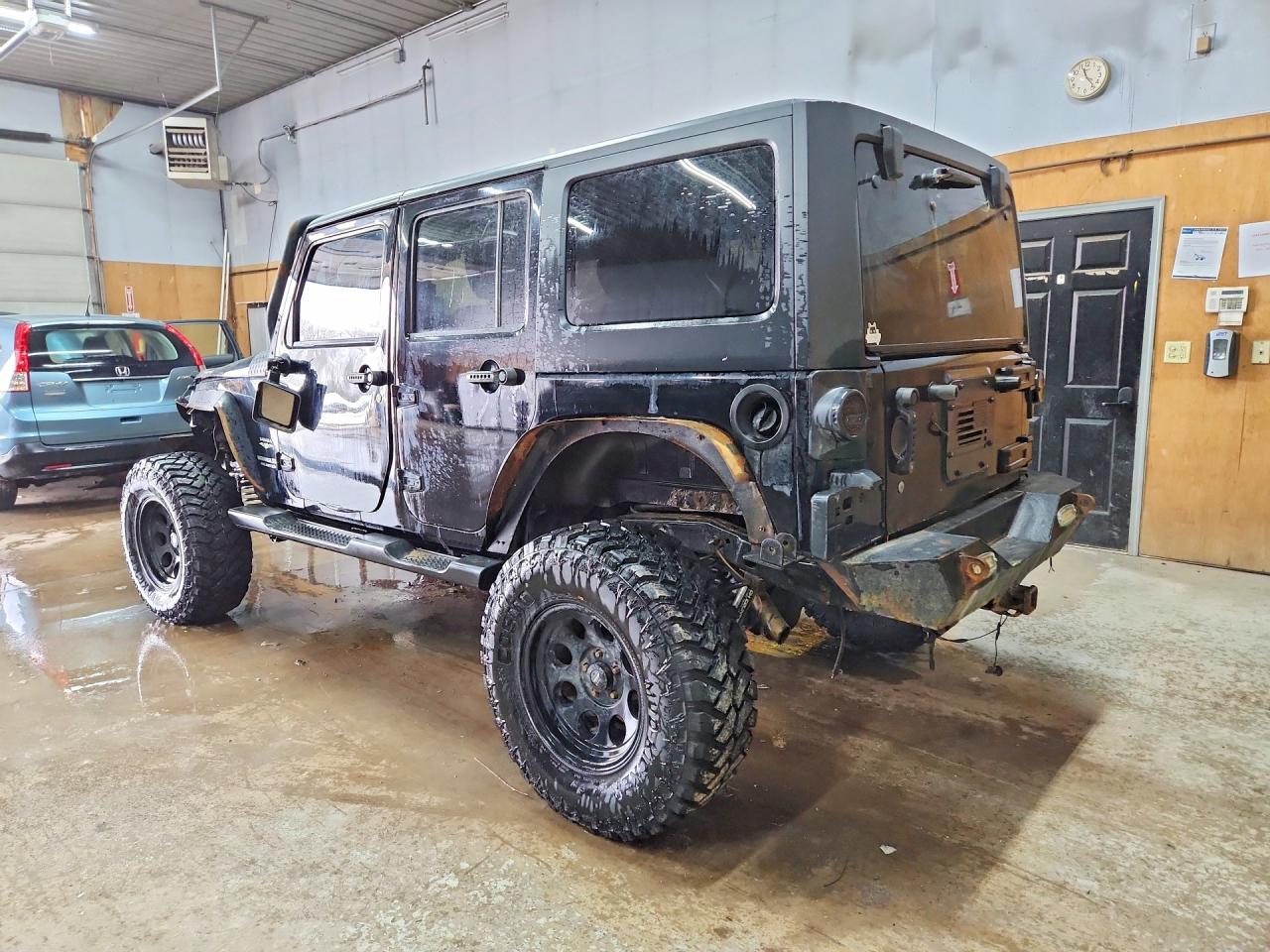 2012 Jeep Wrangler Unlimited Sahara Black vin: 1C4BJWEG9CL103208