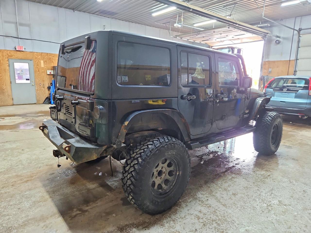 2012 Jeep Wrangler Unlimited Sahara Black vin: 1C4BJWEG9CL103208
