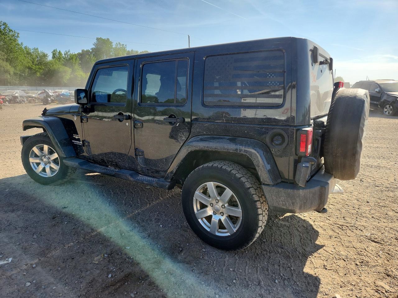 2012 Jeep Wrangler Unlimited Sahara Black vin: 1C4BJWEG9CL173274
