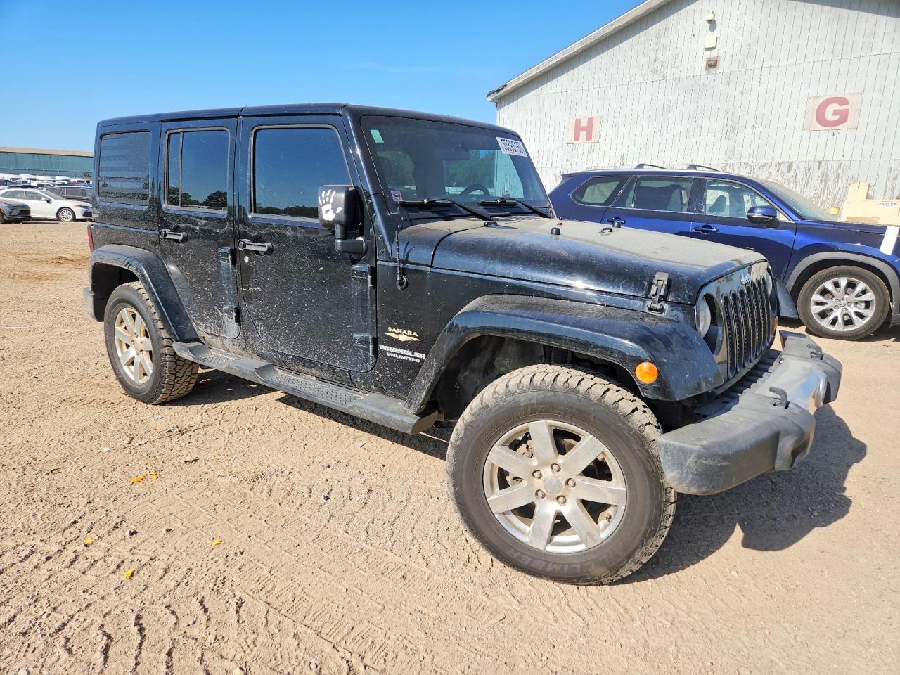 2012 Jeep Wrangler Unlimited Sahara Black vin: 1C4BJWEG9CL173274