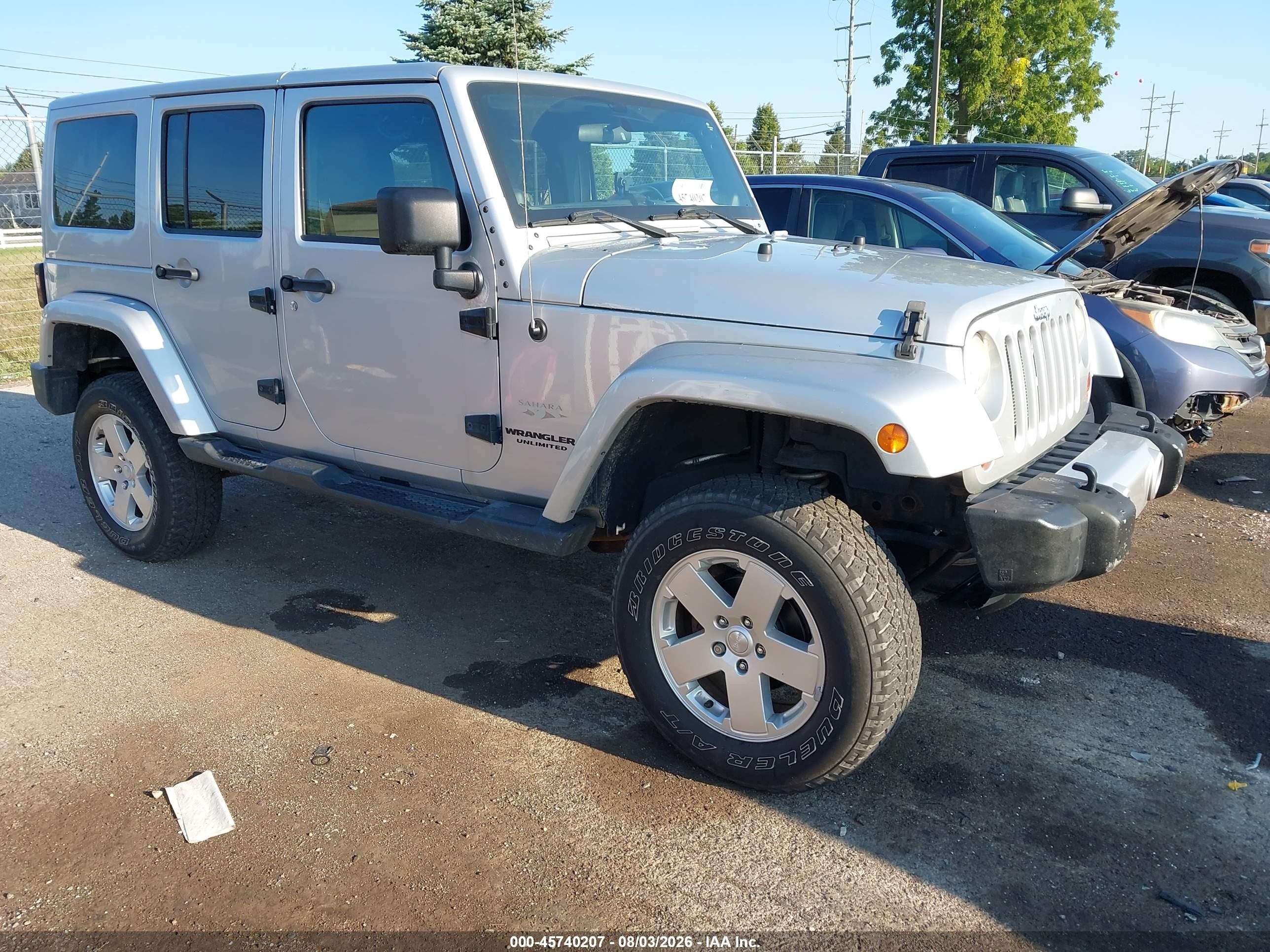 2012 Jeep Wrangler Unlimited Sahara Silver vin: 1C4BJWEG9CL178278