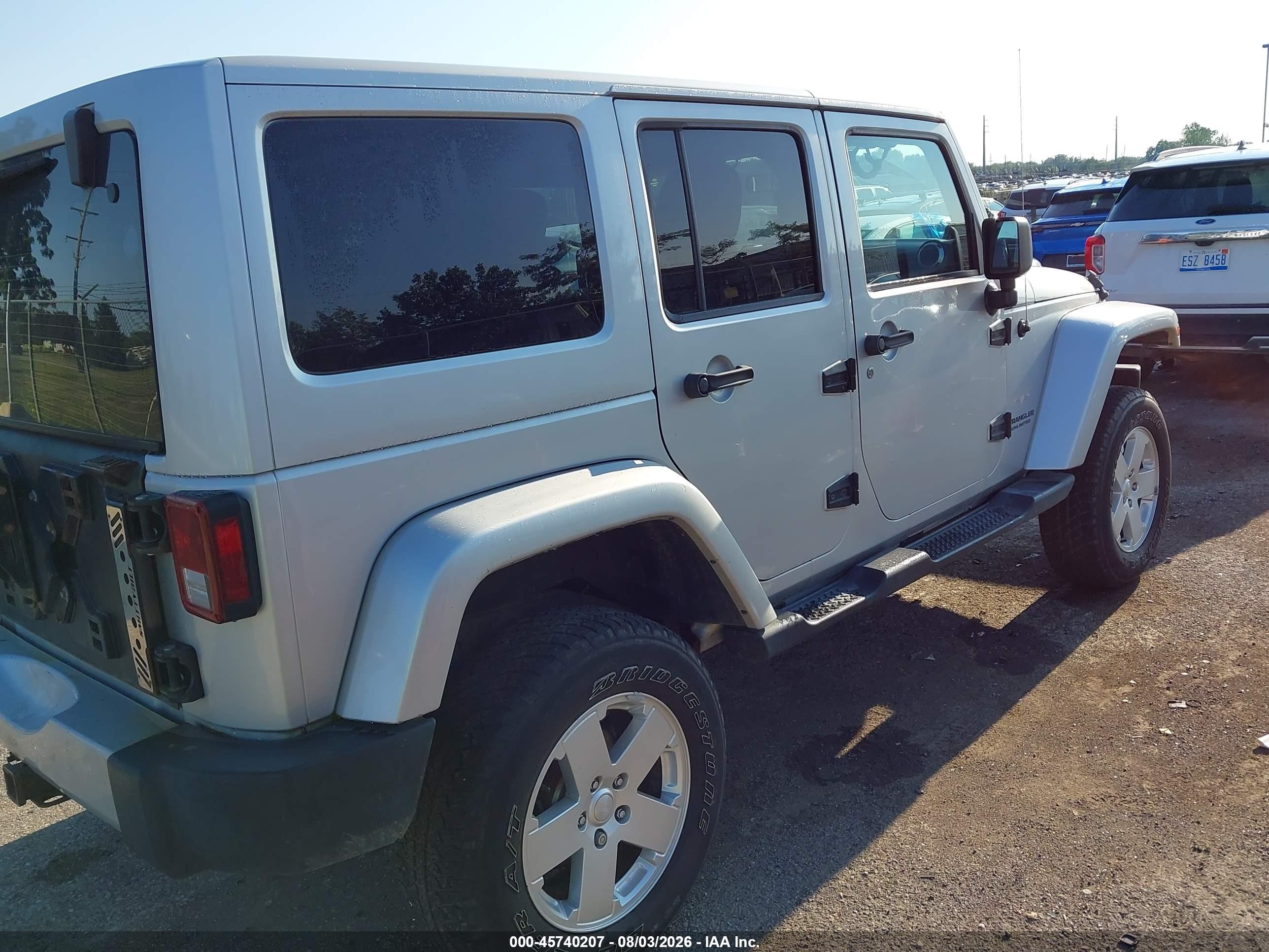 2012 Jeep Wrangler Unlimited Sahara Silver vin: 1C4BJWEG9CL178278