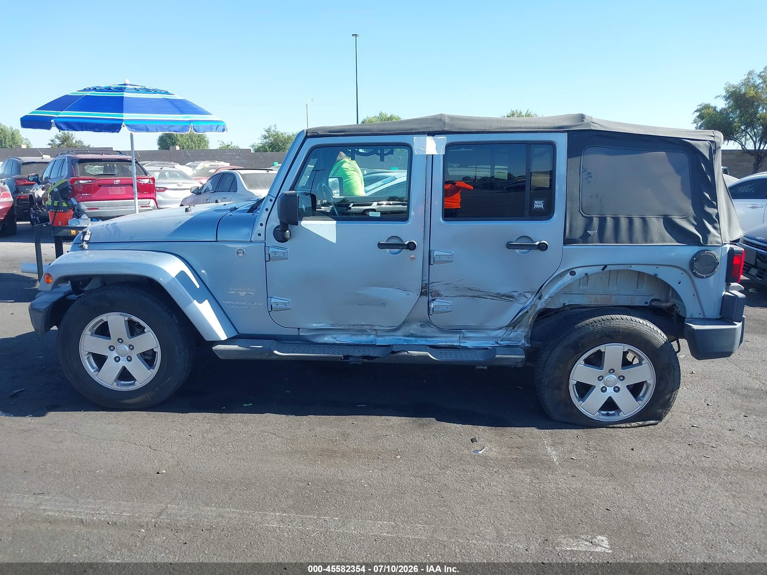 2012 Jeep Wrangler Unlimited Sahara Blue vin: 1C4BJWEG9CL230119