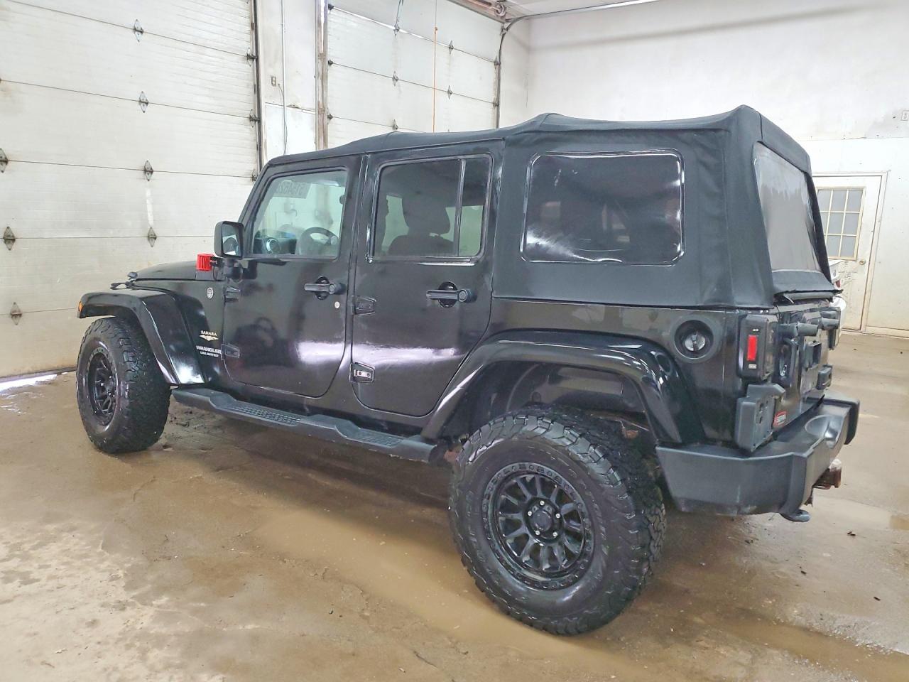 2012 Jeep Wrangler Unlimited Sahara Черный vin: 1C4BJWEG9CL265145