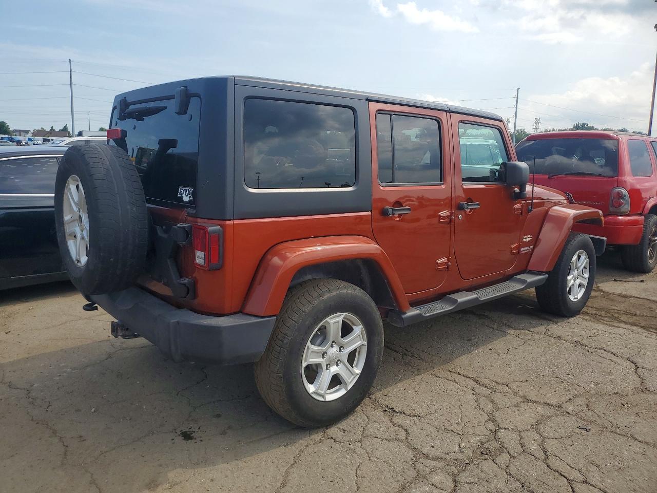2014 Jeep Wrangler Unlimited Sahara Orange vin: 1C4BJWEG9EL261924