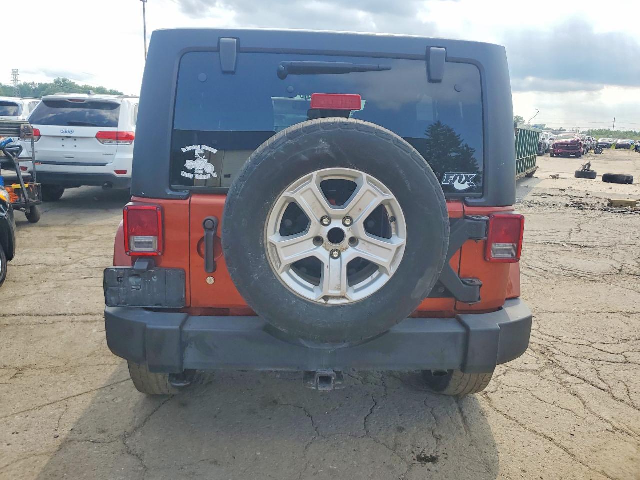 2014 Jeep Wrangler Unlimited Sahara Orange vin: 1C4BJWEG9EL261924