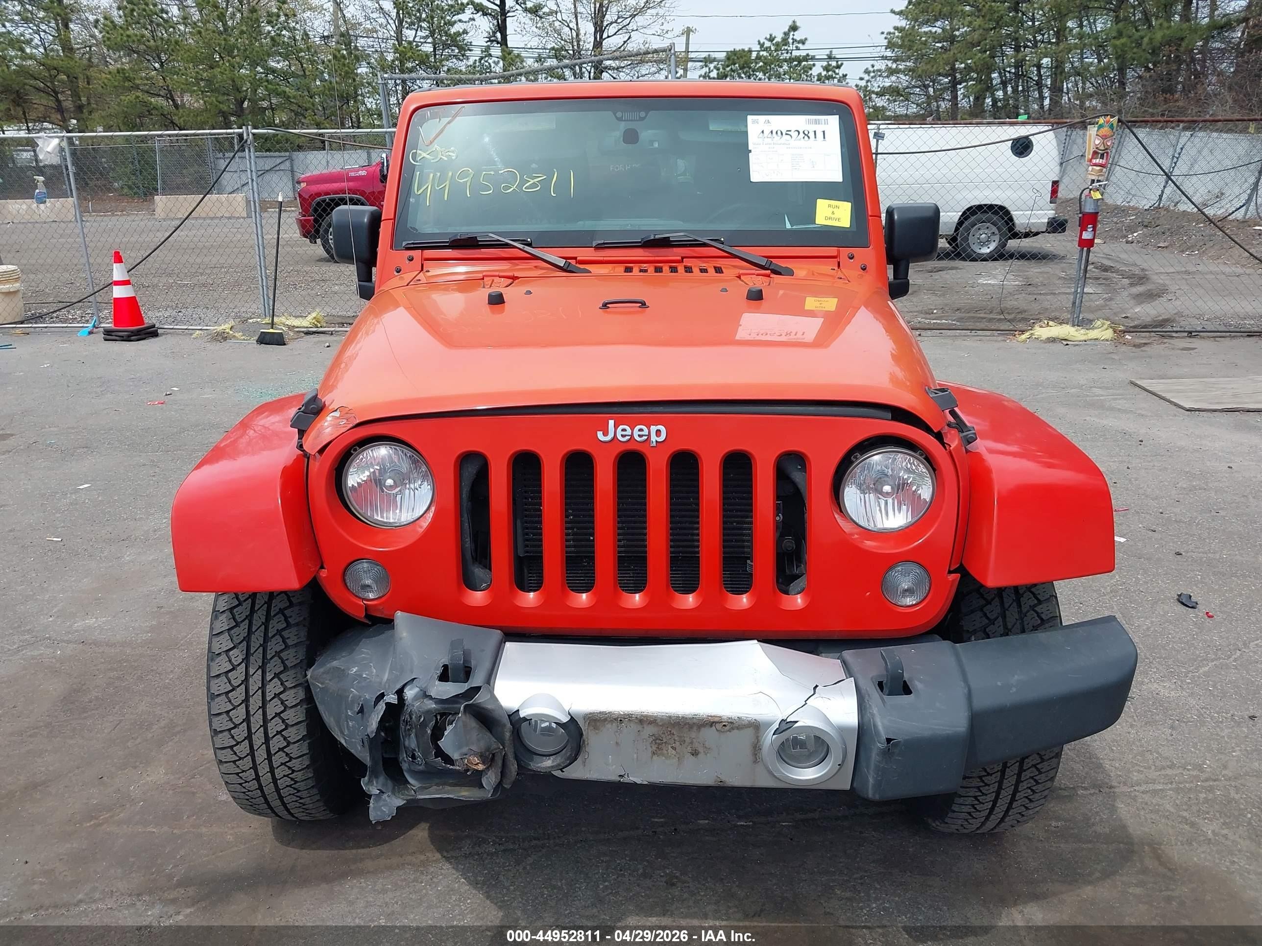 2015 Jeep Wrangler Unlimited Sahara Orange vin: 1C4BJWEG9FL604085