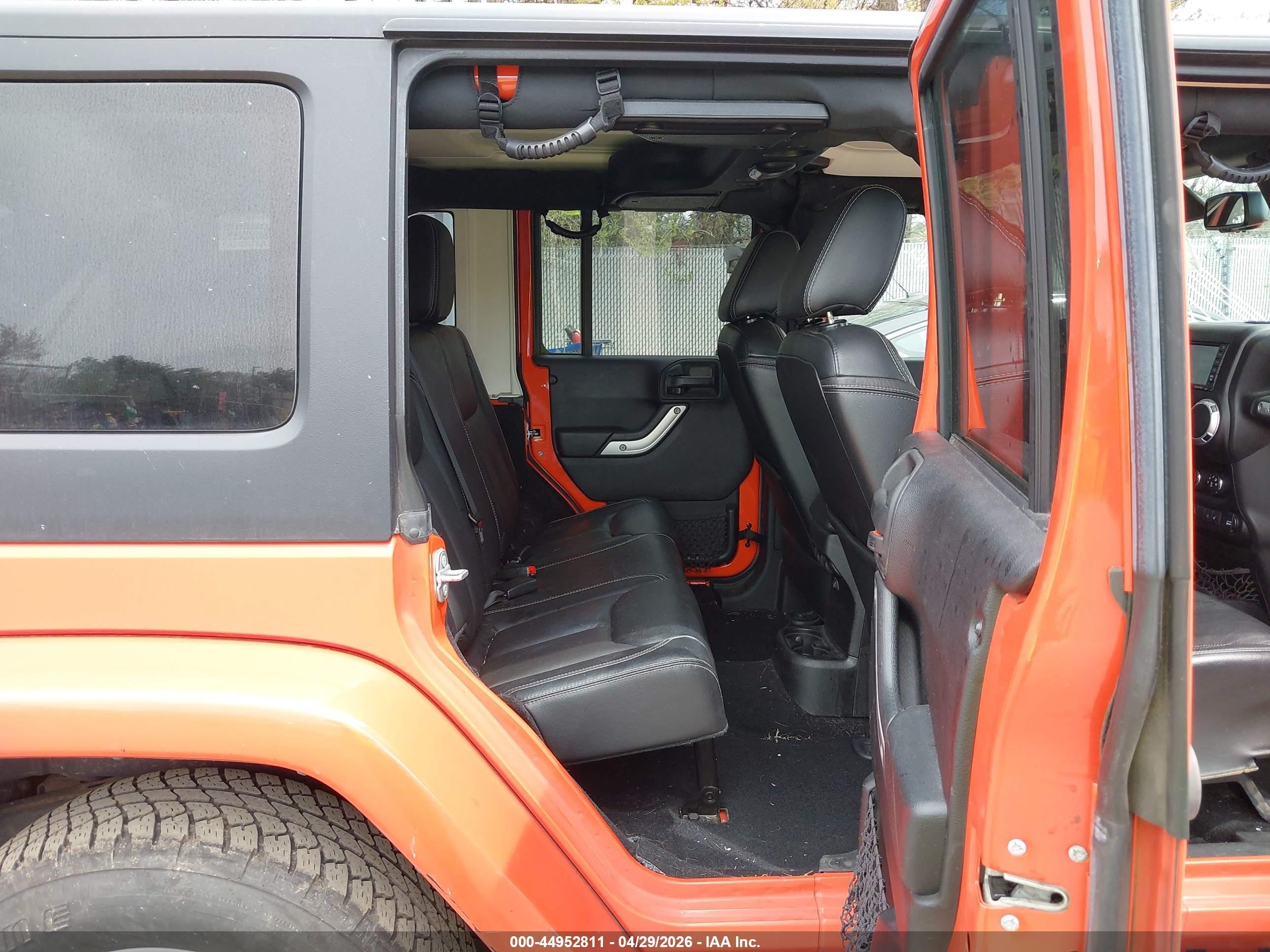 2015 Jeep Wrangler Unlimited Sahara Orange vin: 1C4BJWEG9FL604085