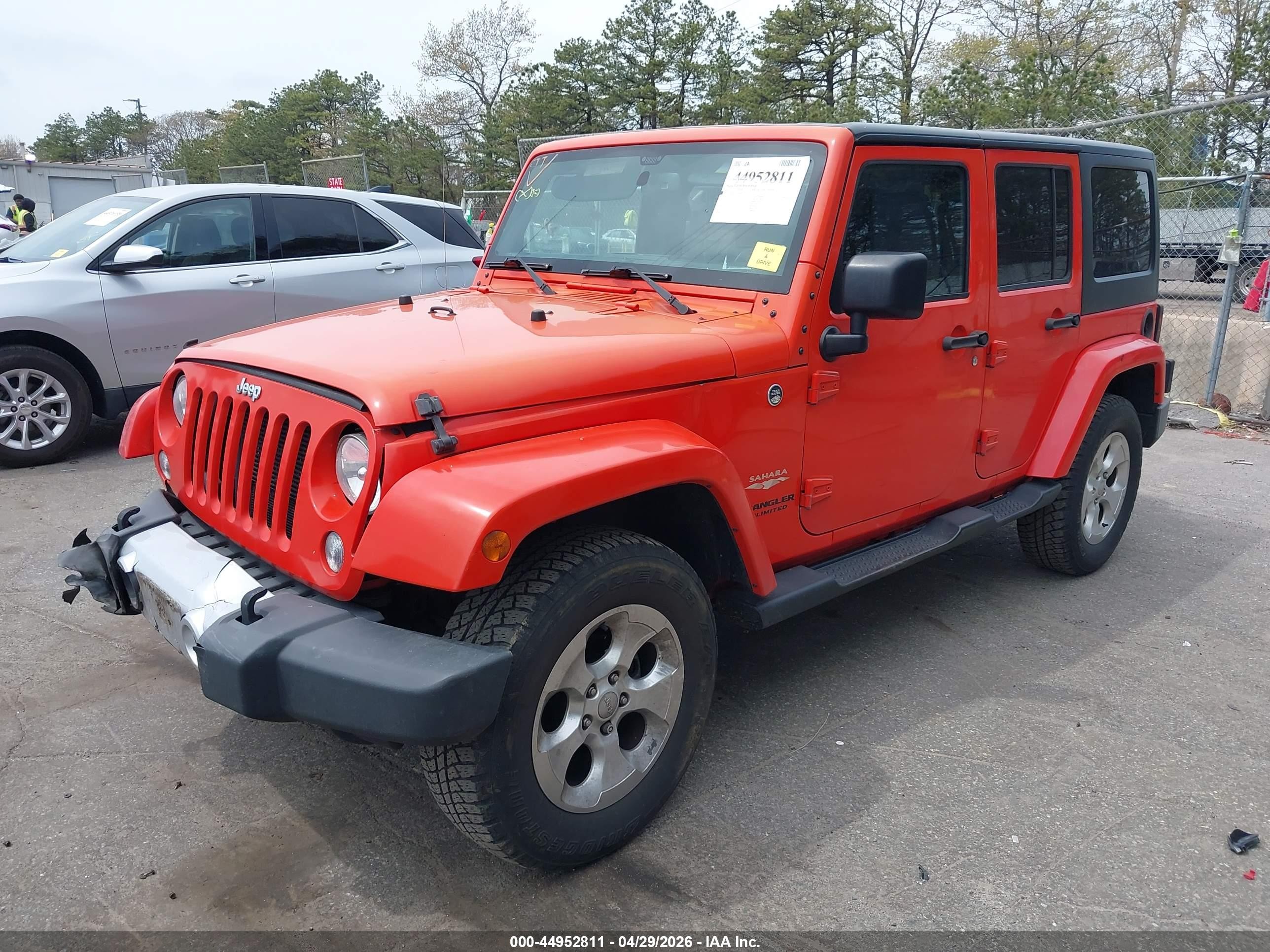 2015 Jeep Wrangler Unlimited Sahara Orange vin: 1C4BJWEG9FL604085