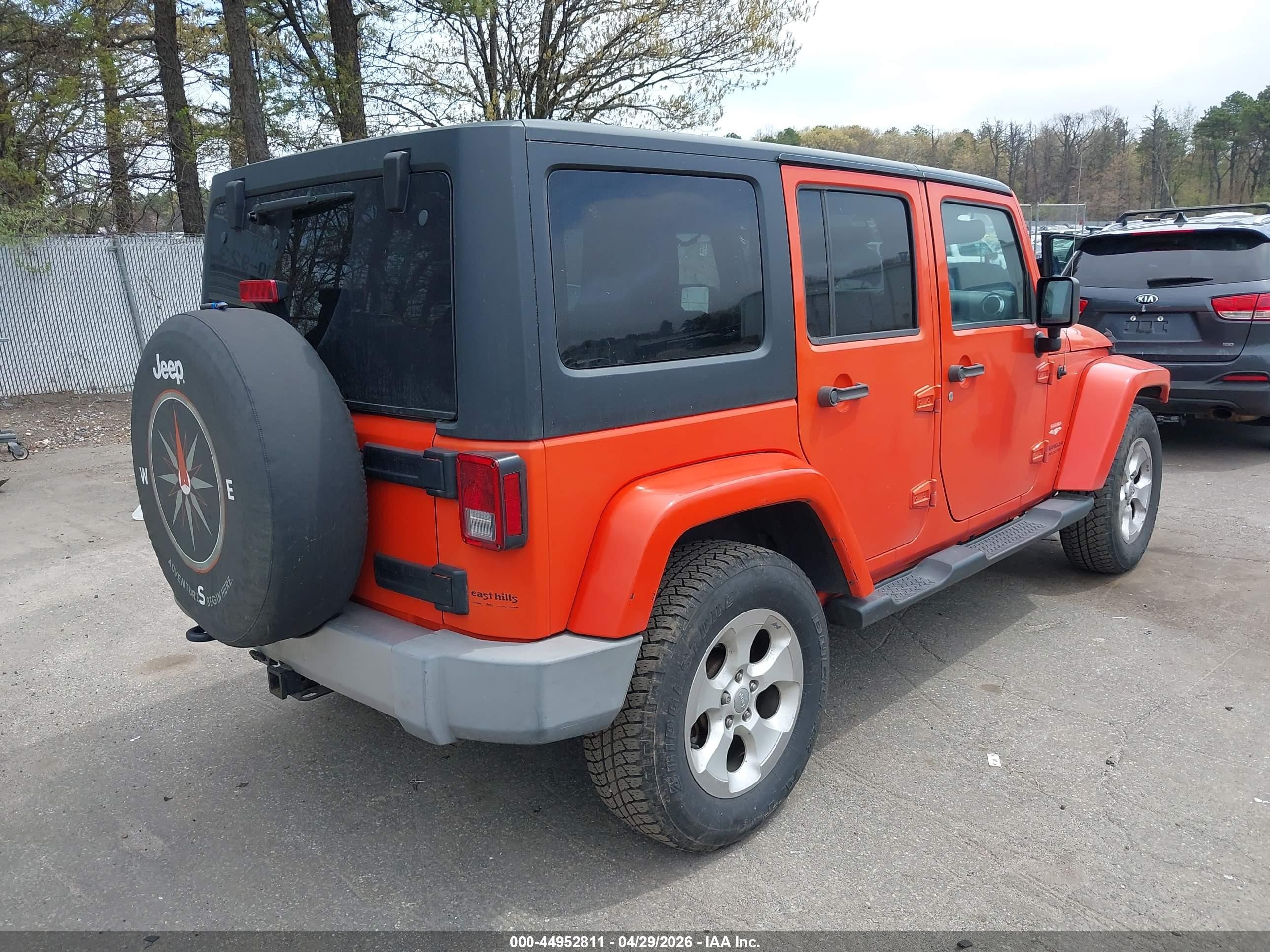 2015 Jeep Wrangler Unlimited Sahara Orange vin: 1C4BJWEG9FL604085