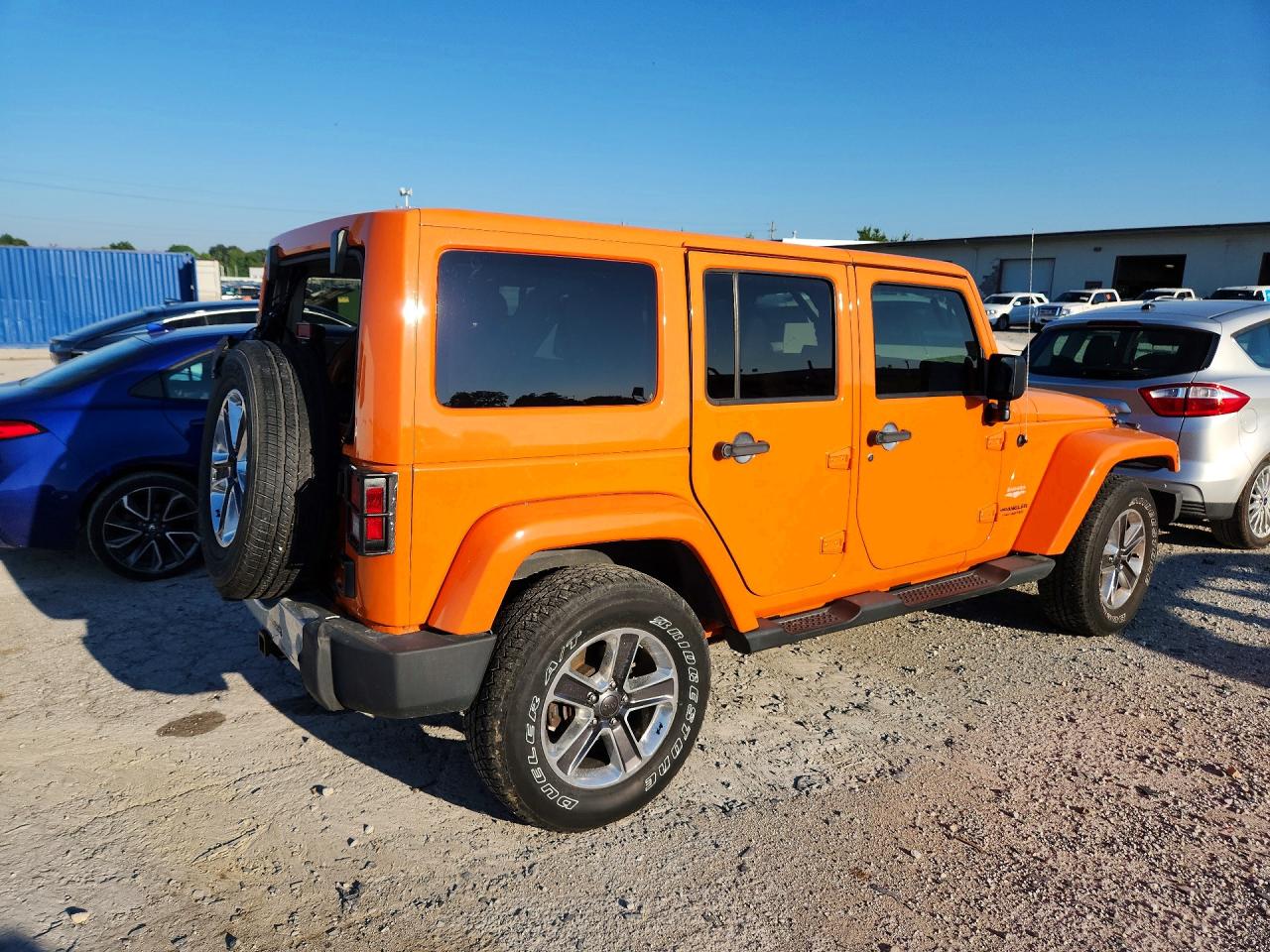2012 Jeep Wrangler Unlimited Sahara Orange vin: 1C4BJWEGXCL170268