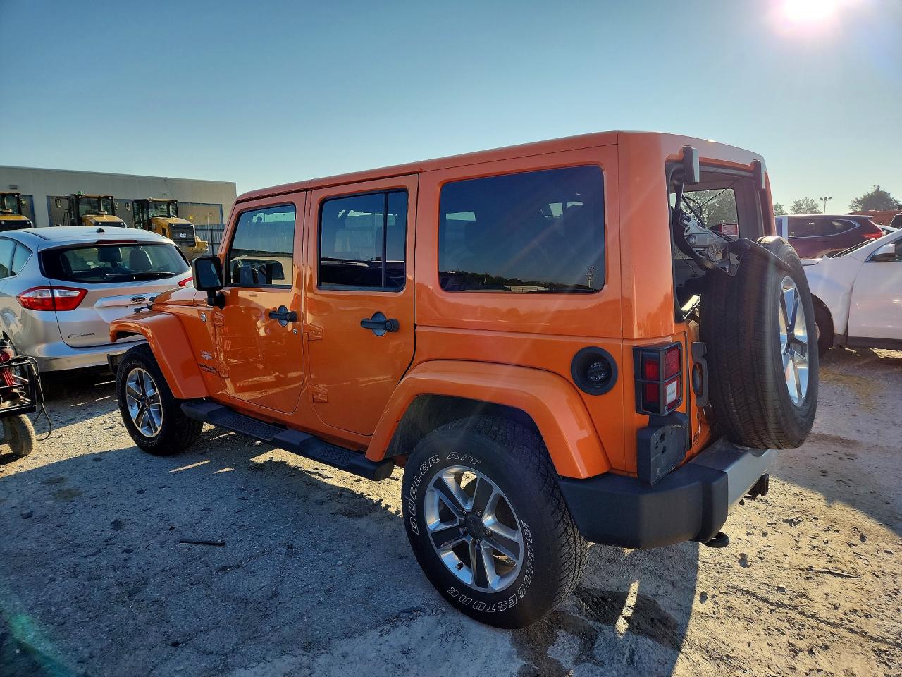 2012 Jeep Wrangler Unlimited Sahara Orange vin: 1C4BJWEGXCL170268