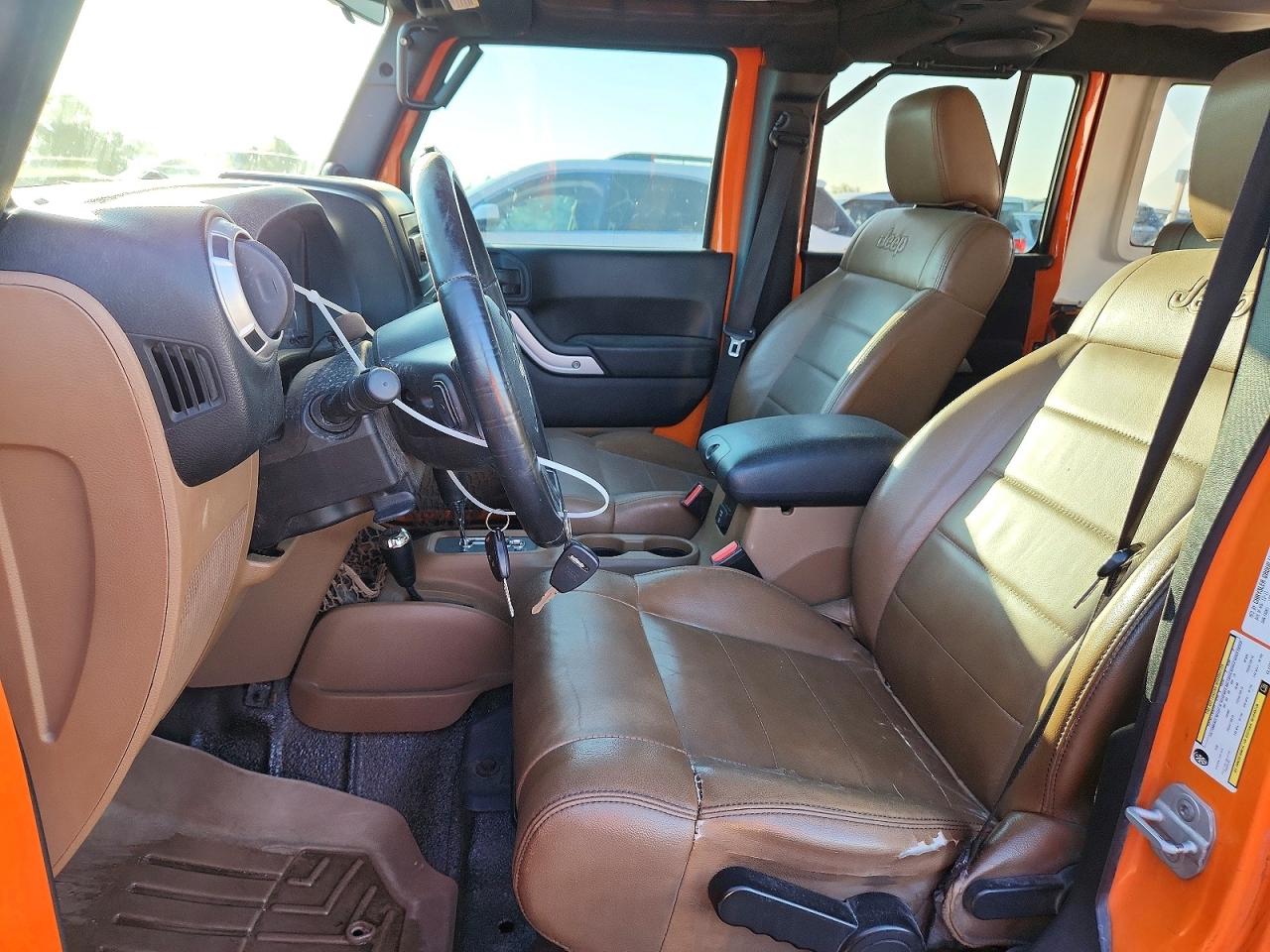 2012 Jeep Wrangler Unlimited Sahara Orange vin: 1C4BJWEGXCL170268