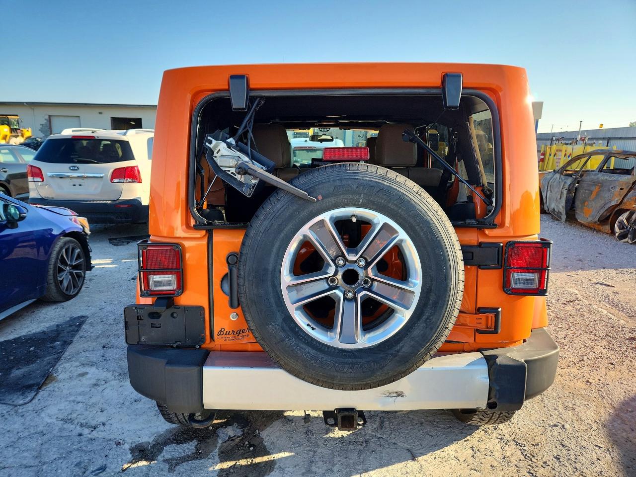 2012 Jeep Wrangler Unlimited Sahara Orange vin: 1C4BJWEGXCL170268