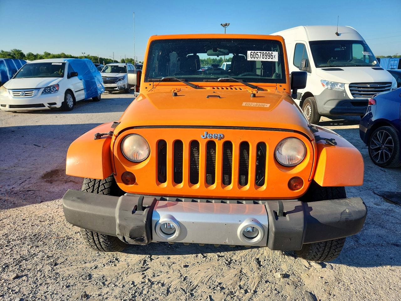 2012 Jeep Wrangler Unlimited Sahara Orange vin: 1C4BJWEGXCL170268