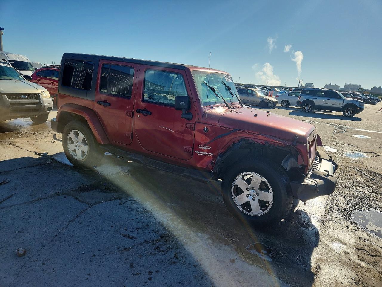 2012 Jeep Wrangler Unlimited Sahara Burgundy vin: 1C4BJWEGXCL173008