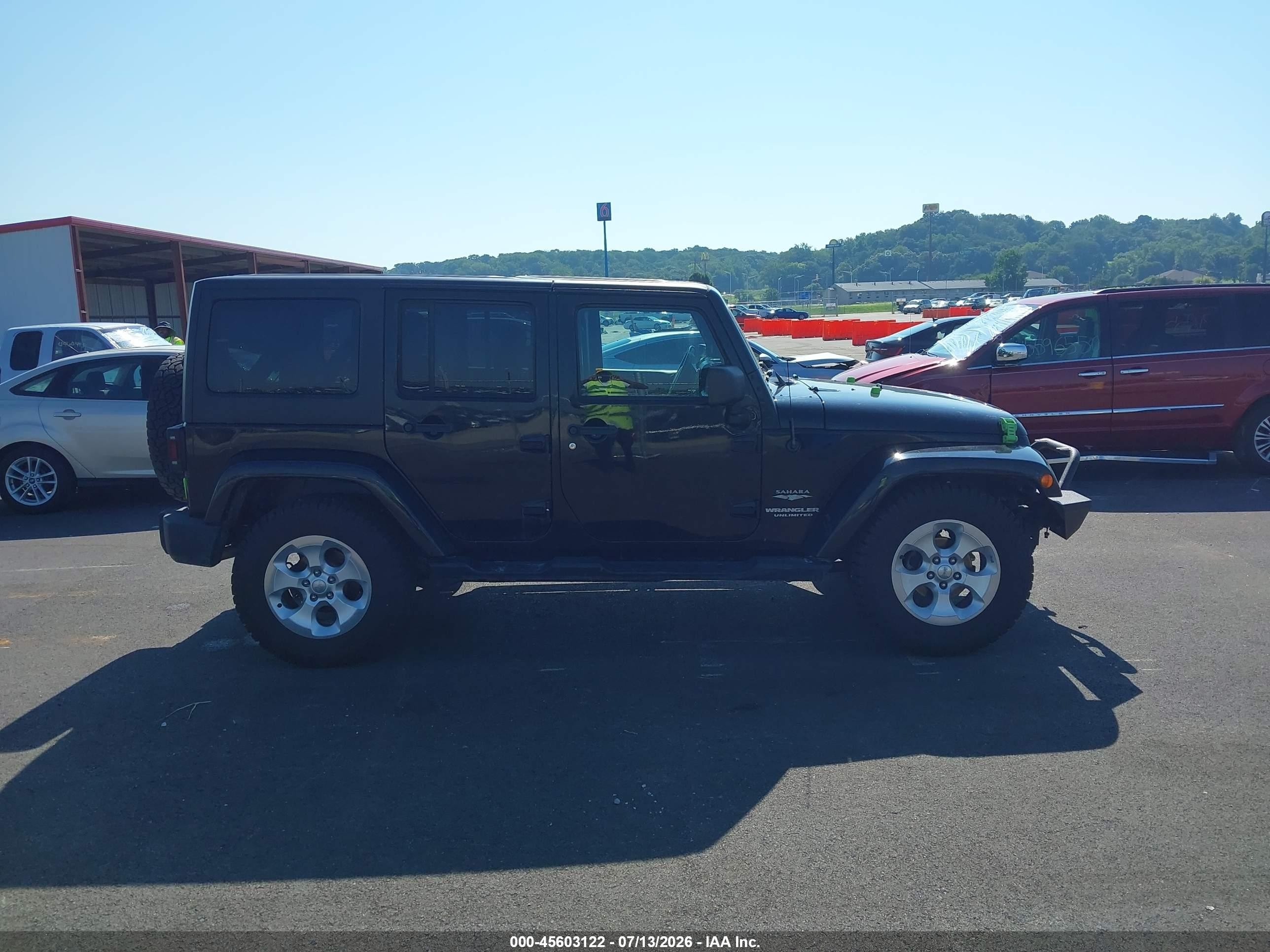 2014 Jeep Wrangler Unlimited Sahara Black vin: 1C4BJWEGXEL121607