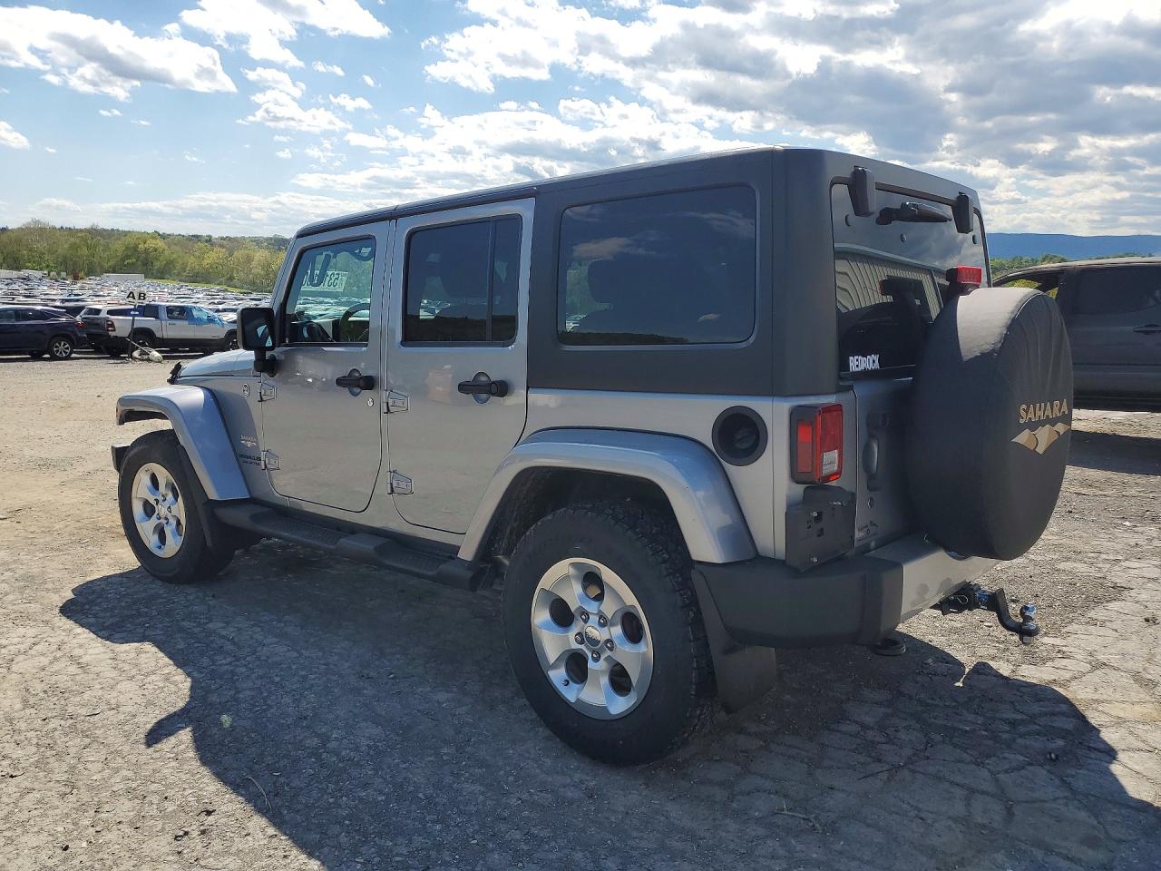 2014 Jeep Wrangler Unlimited Sahara Silver vin: 1C4BJWEGXEL203451