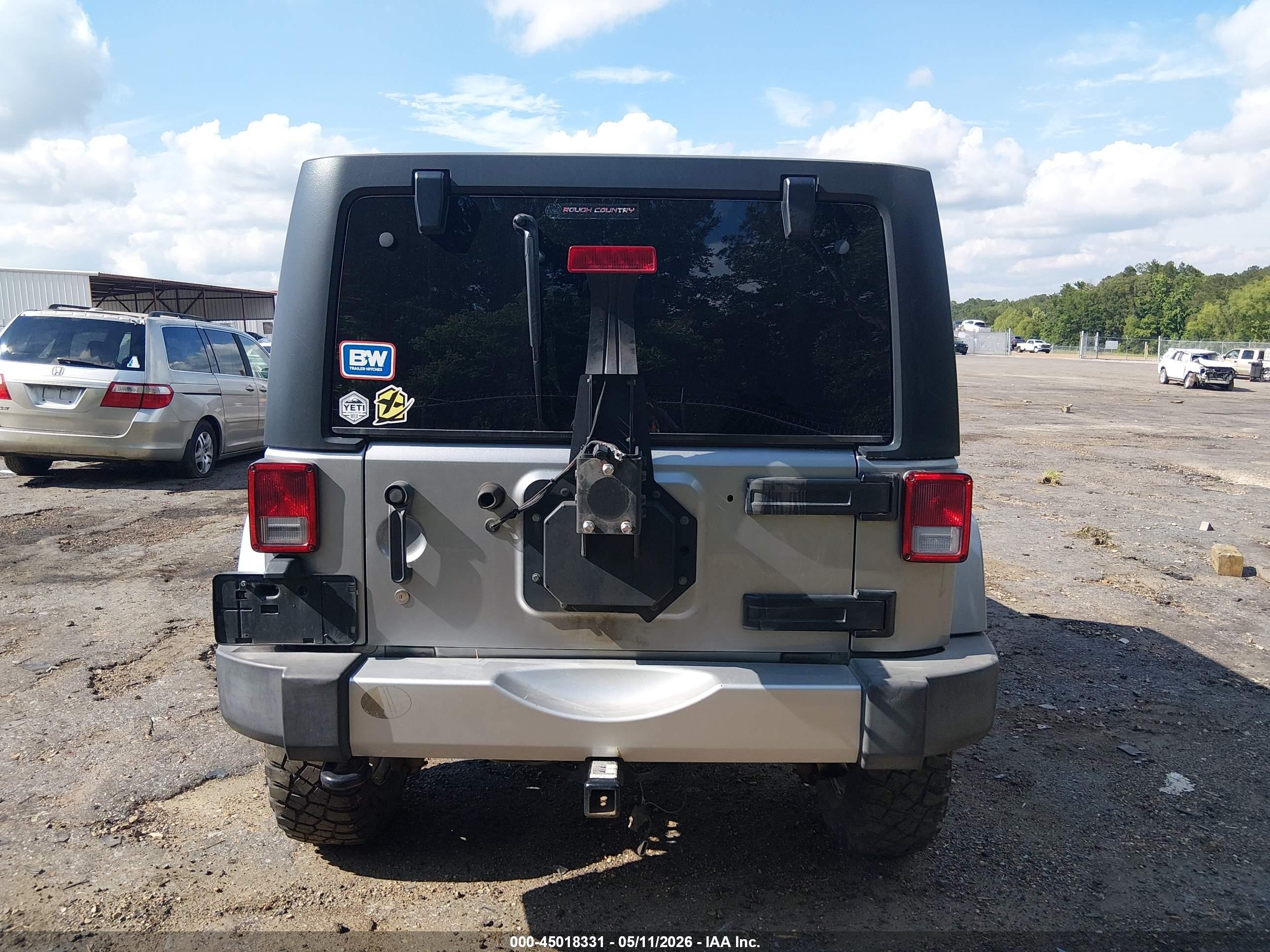 2015 Jeep Wrangler Unlimited Sahara Silver vin: 1C4BJWEGXFL555267